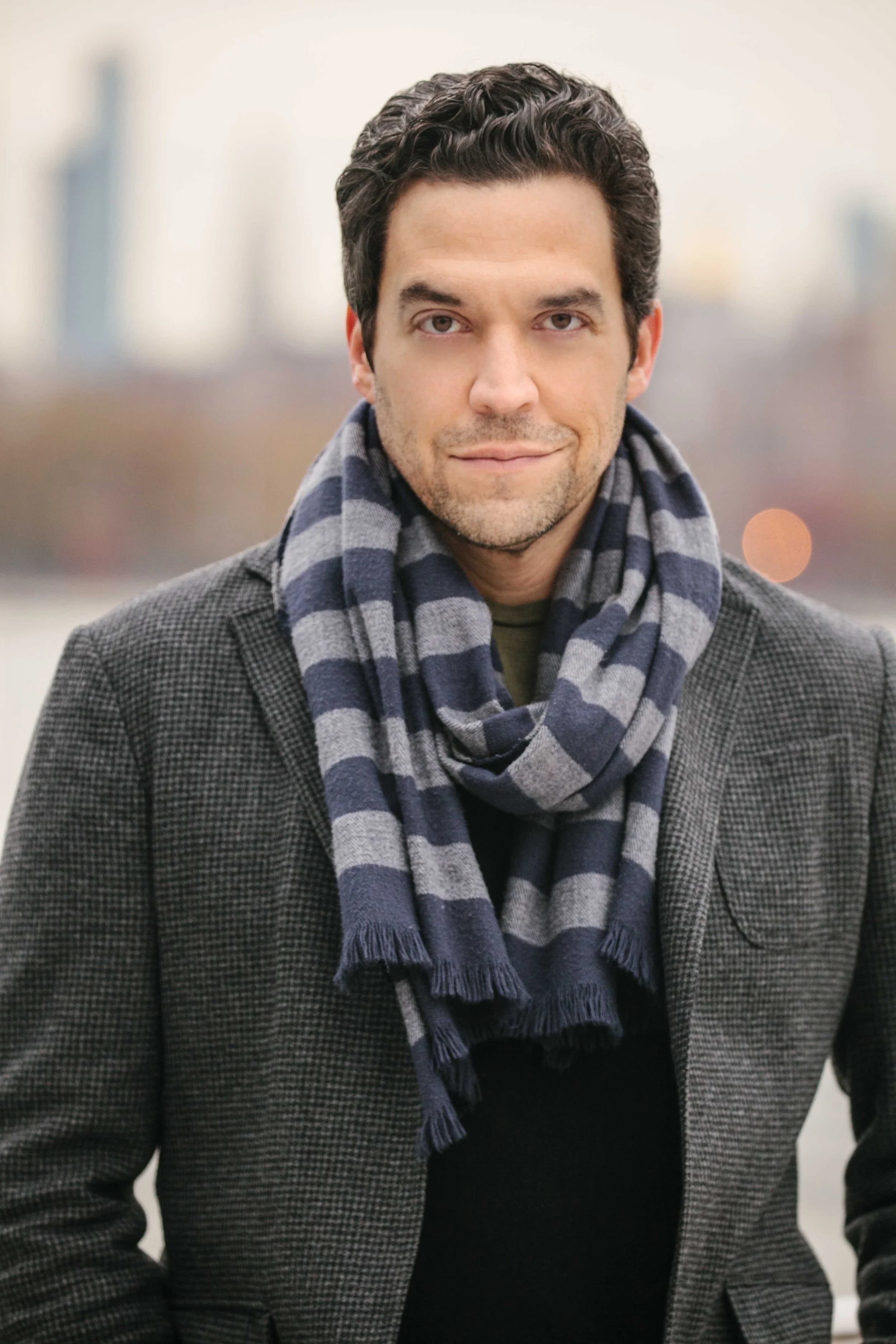 Headshot of NYC-based actor Aaron Serotsky of Marvelous Mrs. Maisel, Ray Donovan, House of Cards, Dopesick, The Good Doctor, Julia. Image taken in Williamsburg on the East River promenade.