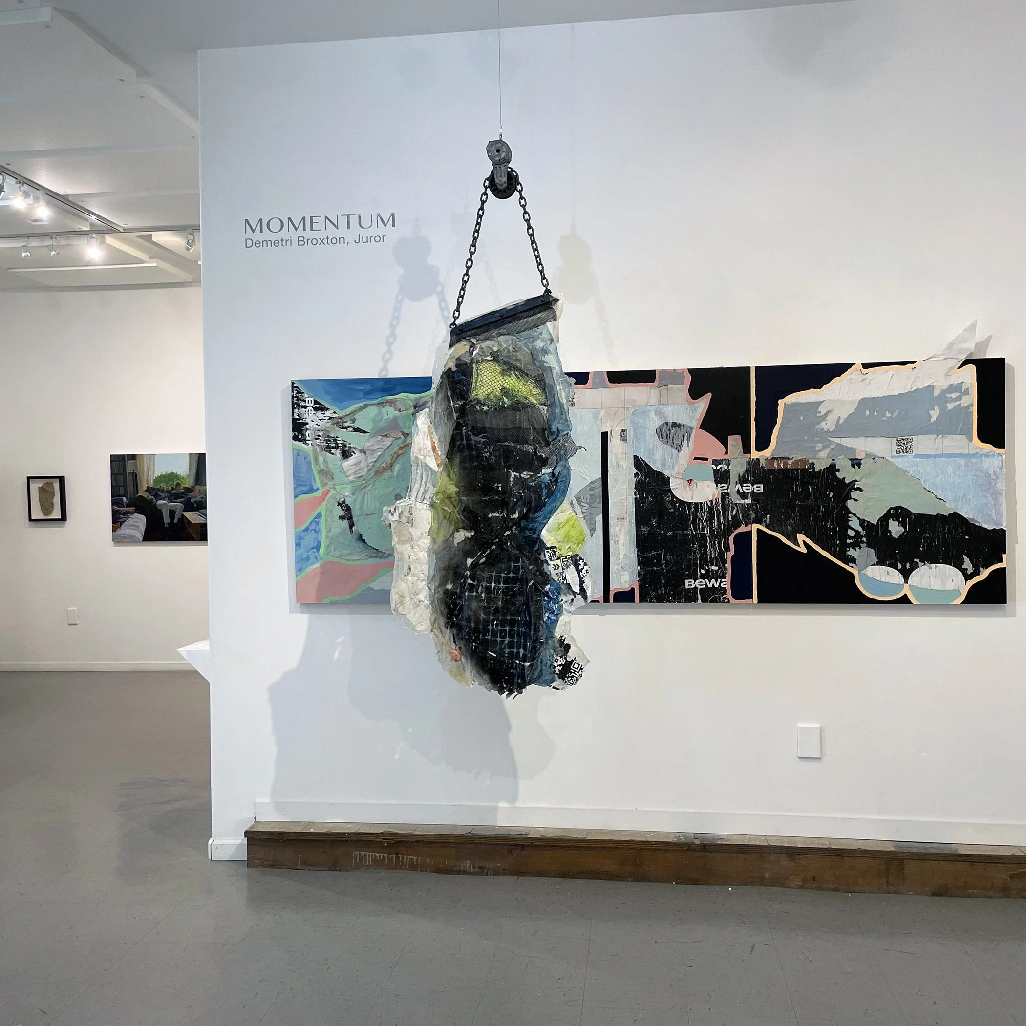 Mary Mocas, The Warning, 2026, mixed media collage on panel with hanging acrylic pour, 75 x 108
