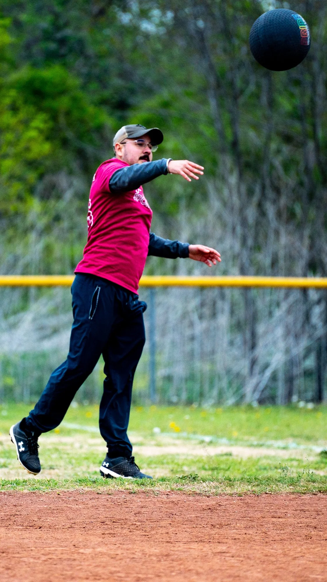 High-impact sports action photo capturing an athlete mid-play with intensity and focus during a competitive game. This image highlights speed, strength, and determination—perfect for showcasing peak performance and athletic energy.