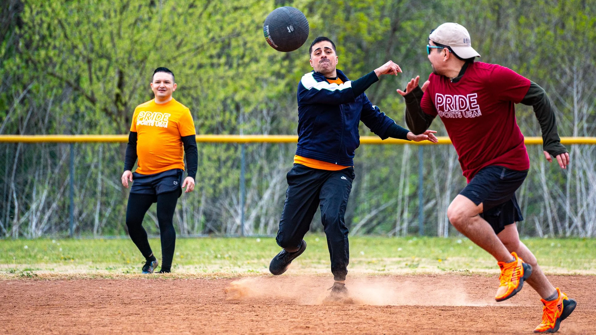 Man throws ball for the out.  Sports and Club Photography Dallas.jpg