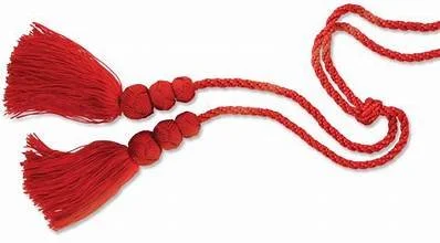 Red decorative tassels with braided cords