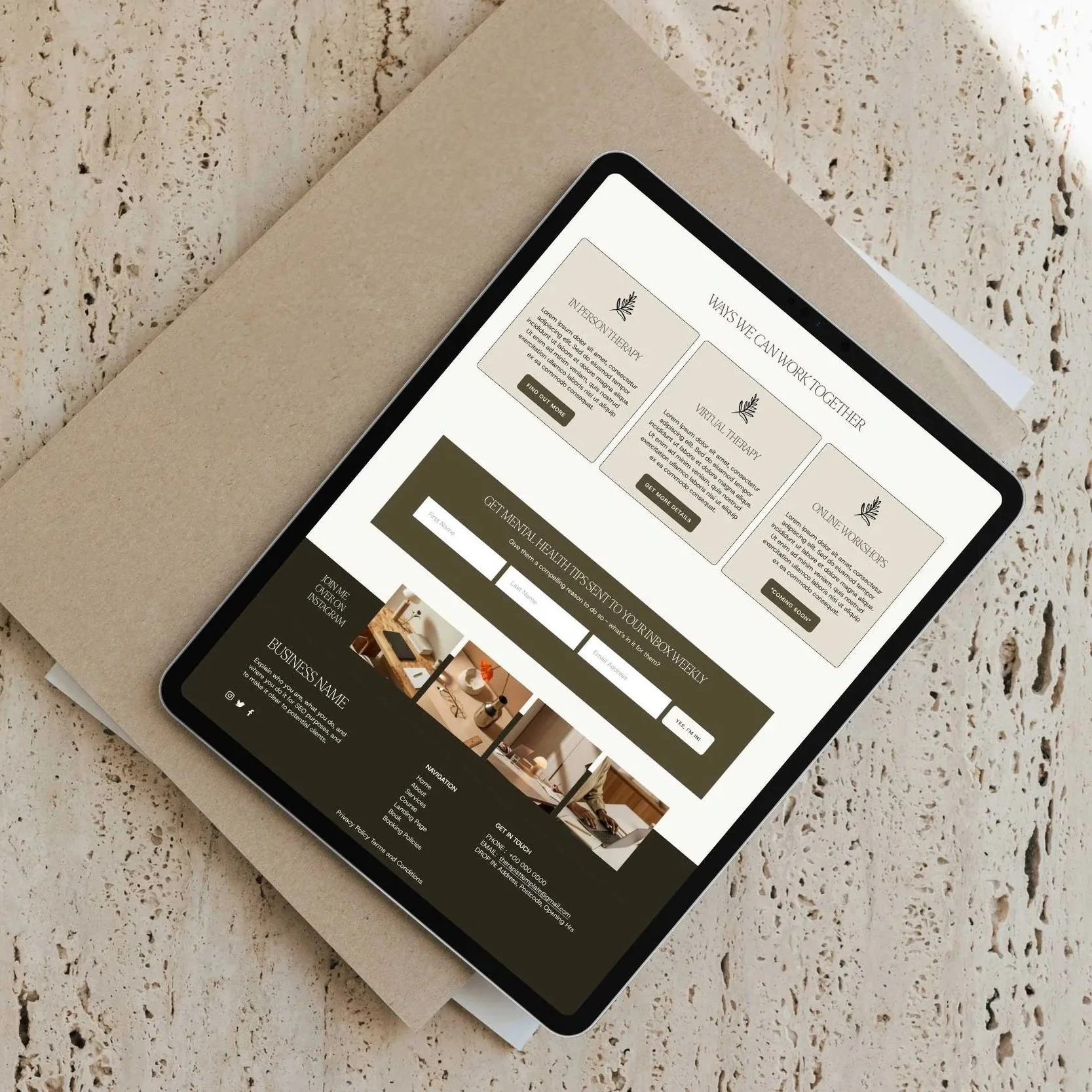 A tablet displays a Newsletter form on a therapist website design, resting atop two magazines on a textured white surface.
