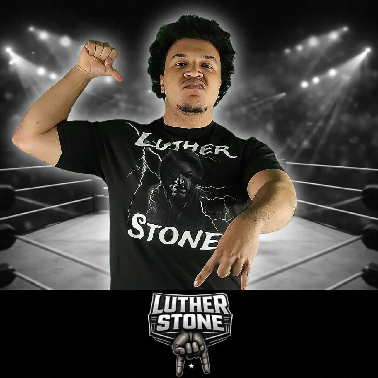 Man with curly hair making a gesture with his hand in a wrestling ring, wearing a black T-shirt with 'Luther Stone' and an image of a person's face on it, with a logo of 'Luther Stone' below him.