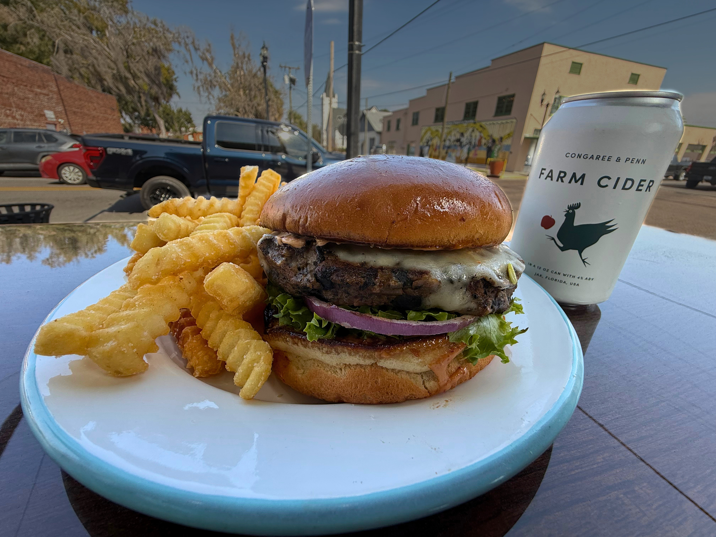 The Cali Burger, a vegetarian burger served with crinkle-cut fries at The Fillin' Station in Palatka, Florida.