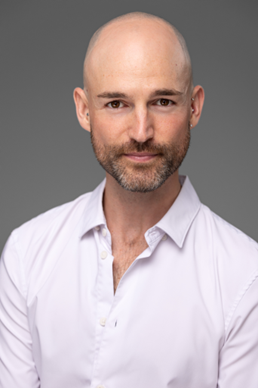Jonathan Whitlow, a vocal director and teacher for musical theatre and drama for high school students.