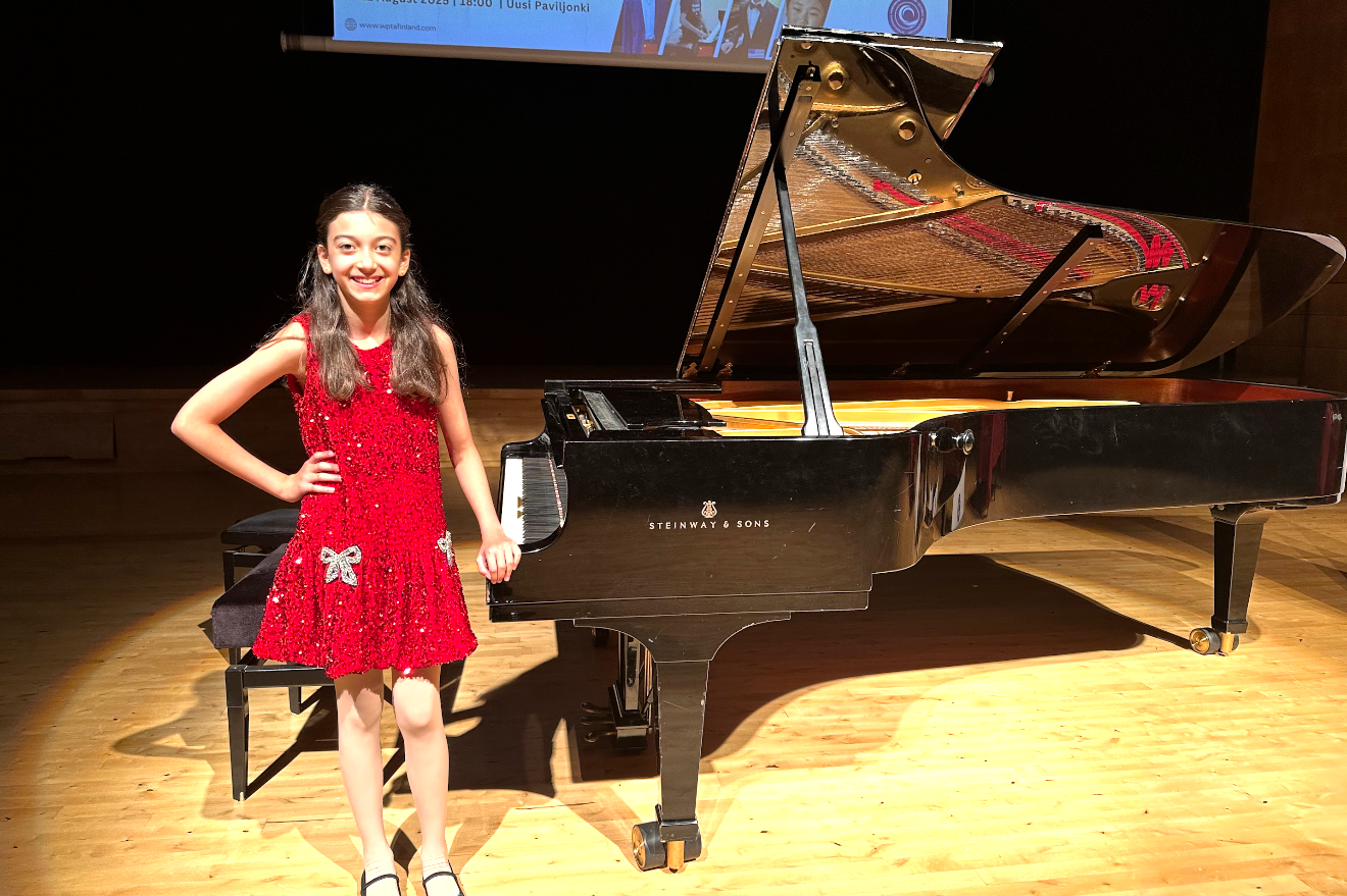 Sharing her love of piano with audiences near and far.