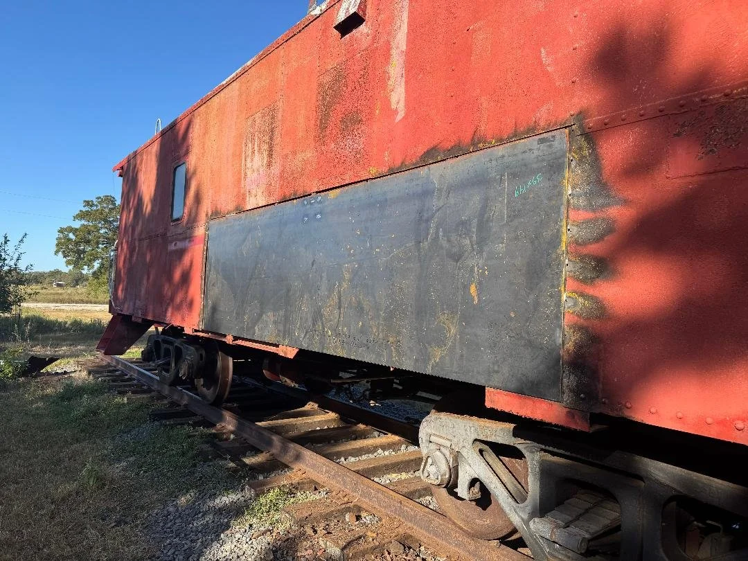This train car features targeted rust repair along with stair repairs to improve safety and usability. The updates extend the life of the structure while maintaining its appearance. 