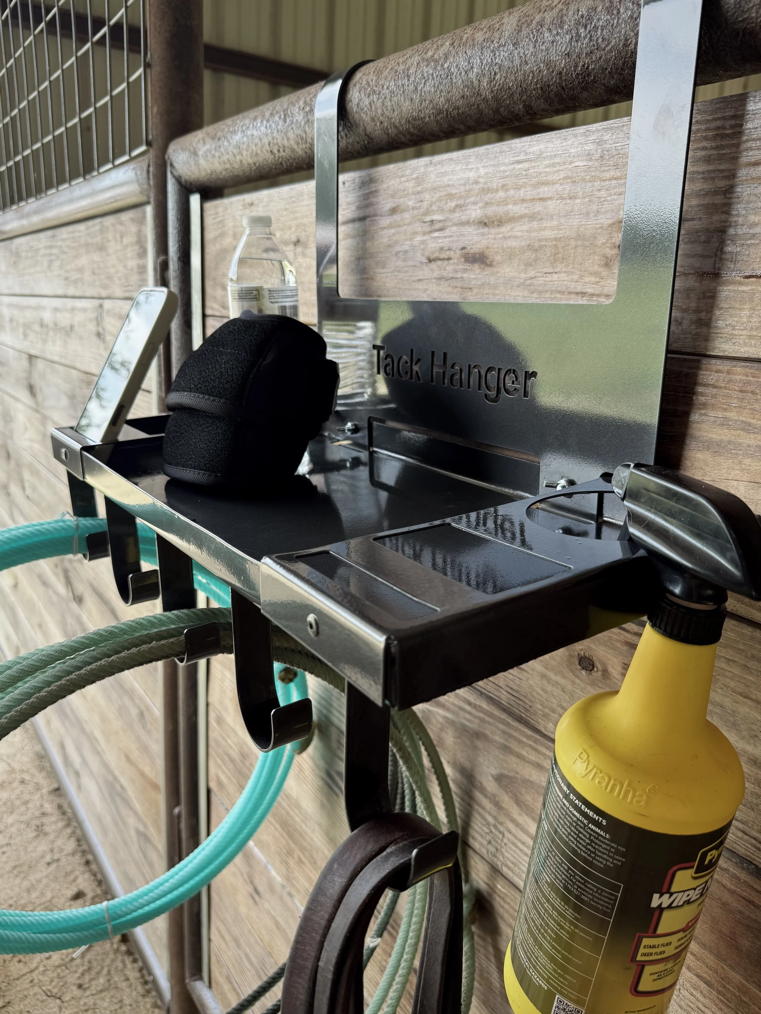 Original Tack Hanger Close-Up Highlighting Storage Tray, Multiple Hooks, and Organized Gear Storage.