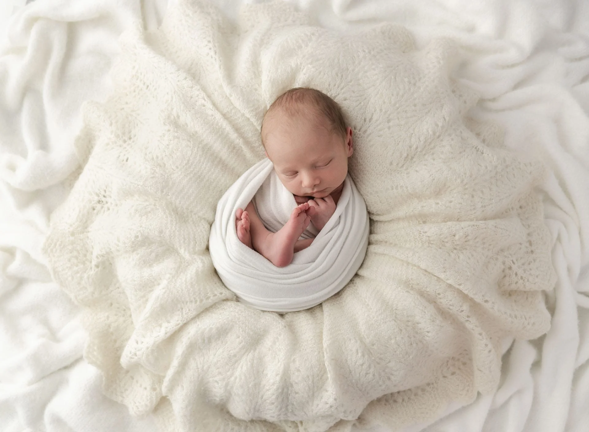 Wrapped Newborn photography session in Bishopdale Christchurch