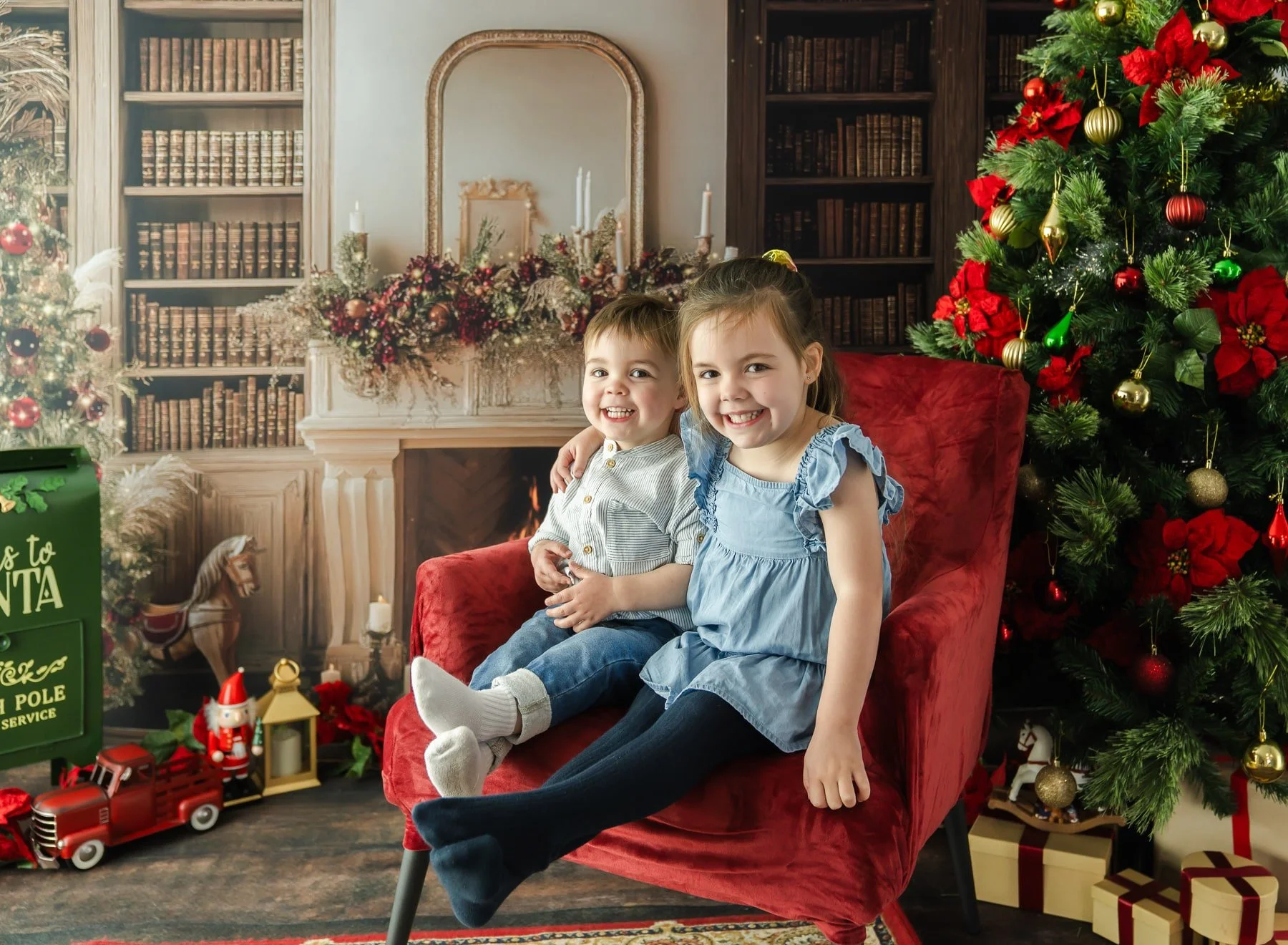 Sibling children having fun at Christmas mini session Christchurch photographer