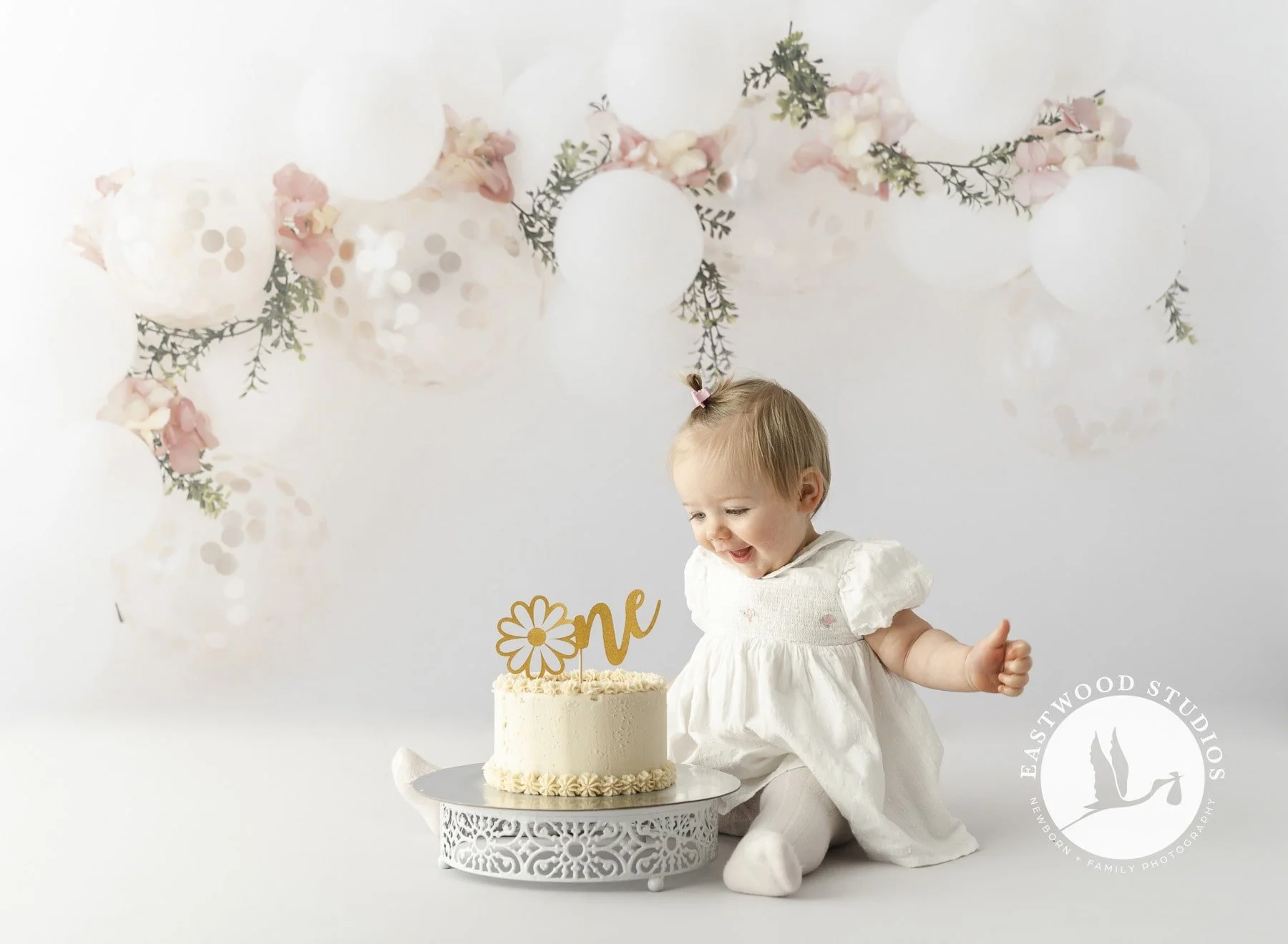 Joyful cake smash photography capturing first birthday Canterbury