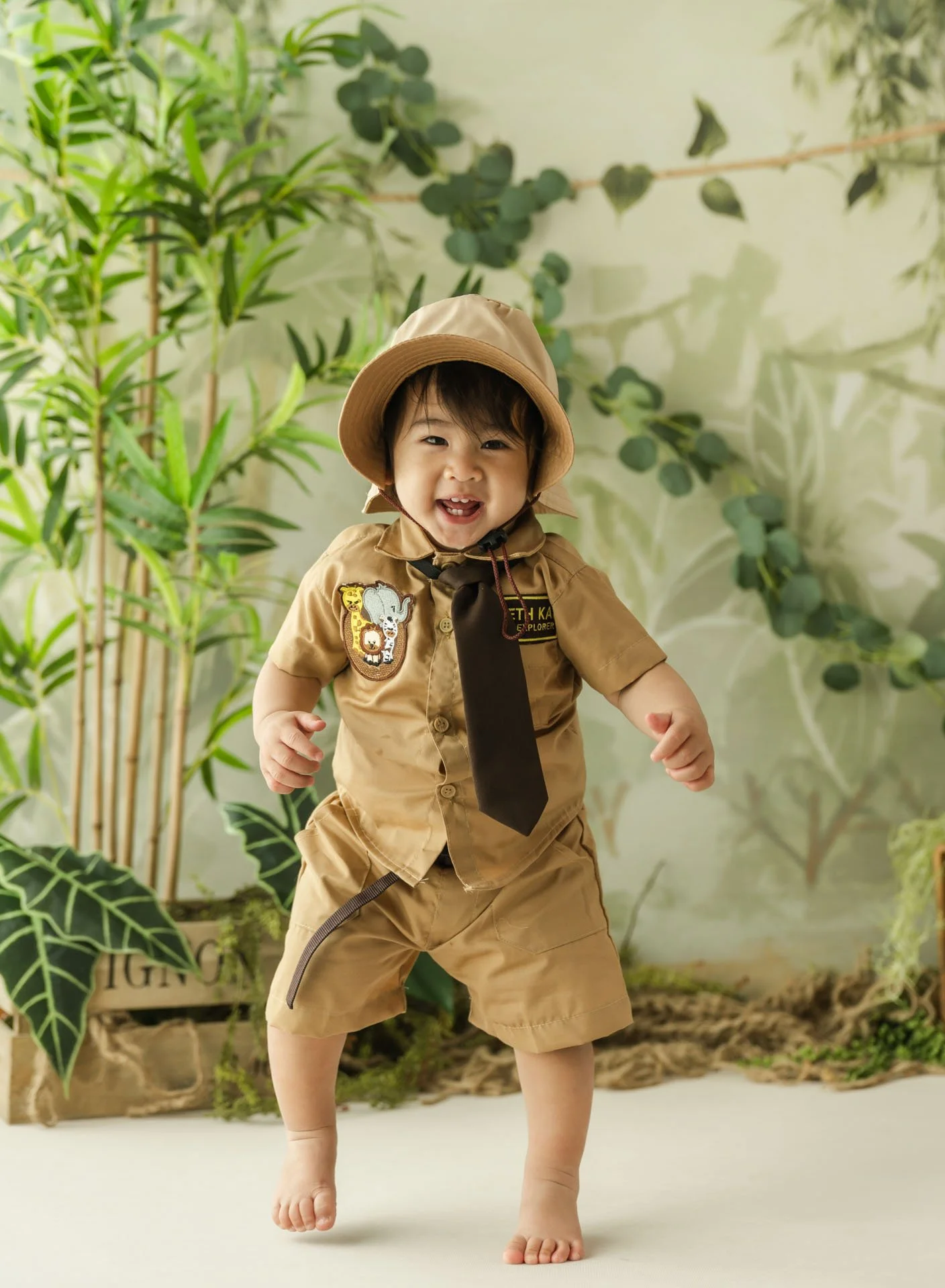 Cute baby boy with safari theme milestone photography session by Christchurch photographer