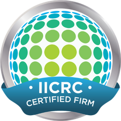 Logo of IICRC Certified Firm with a globe design made of green and blue dots and a blue banner