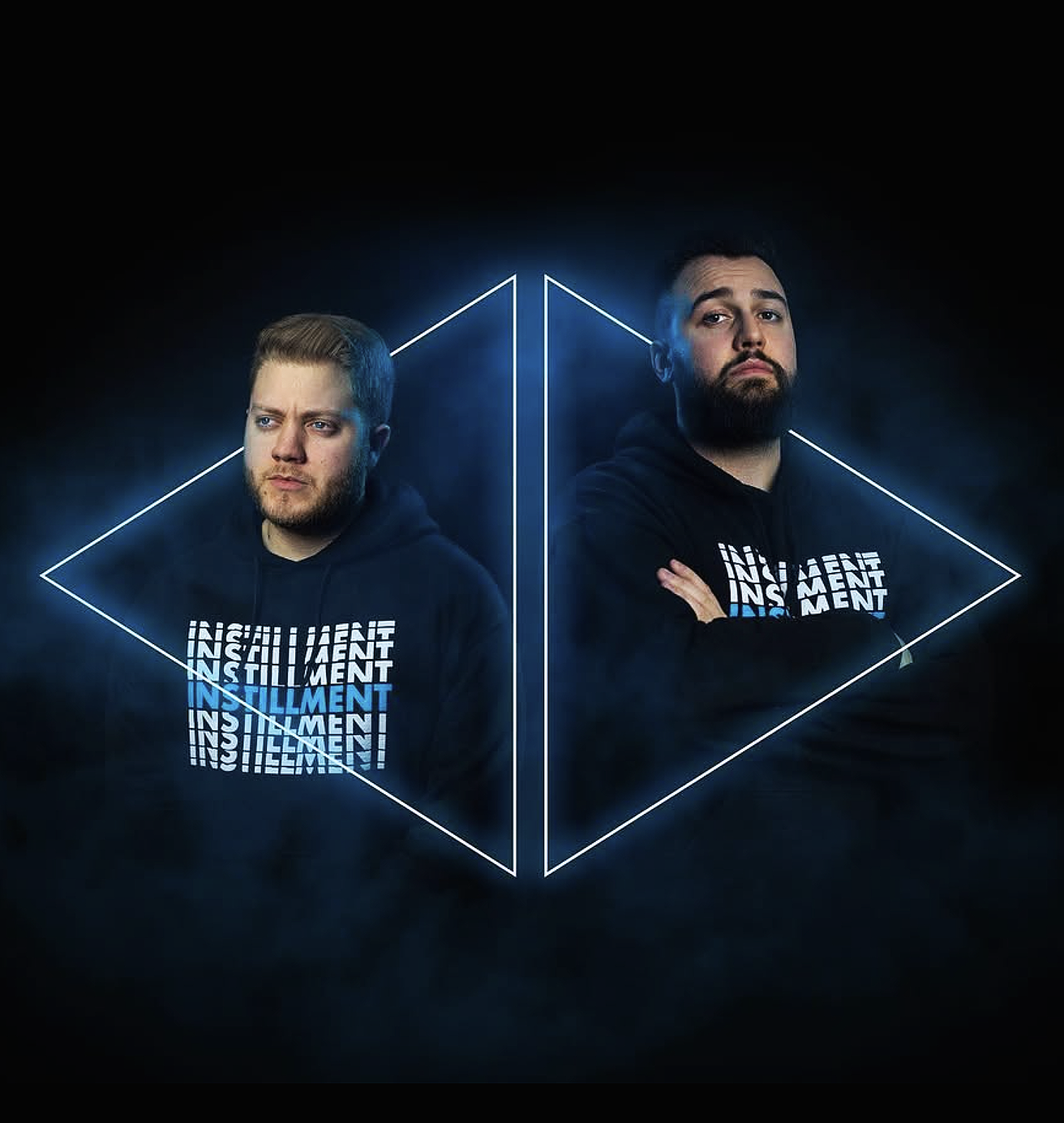 Two men in black hoodies with stylized text 'Insillment' pose in front of a dark background with geometric neon lines forming a 3D cube.