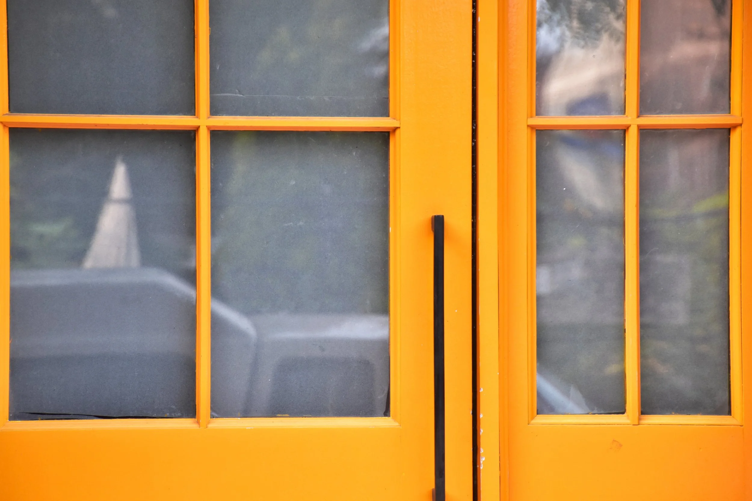 yellow door with shadows.jpg