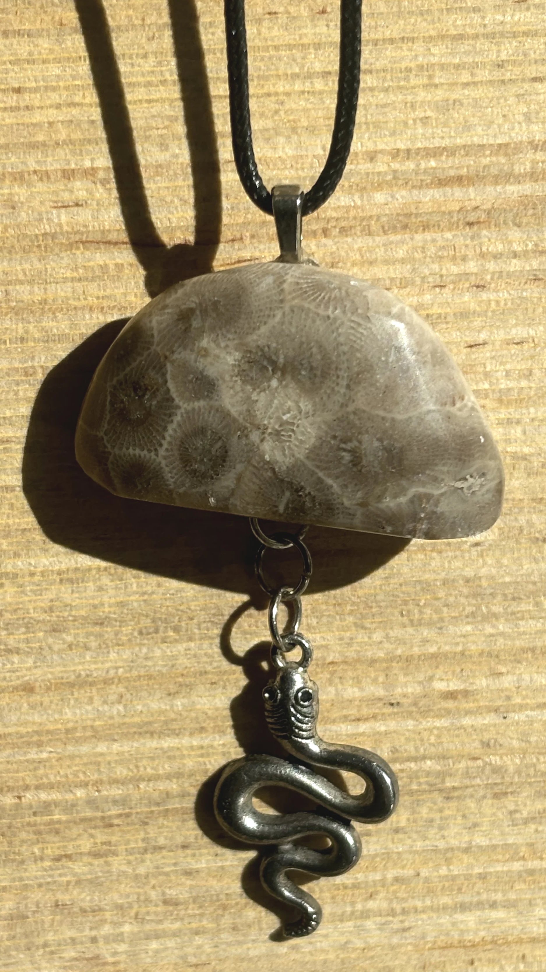 Edgy Half Moon Petoskey Necklace with Snake Charm