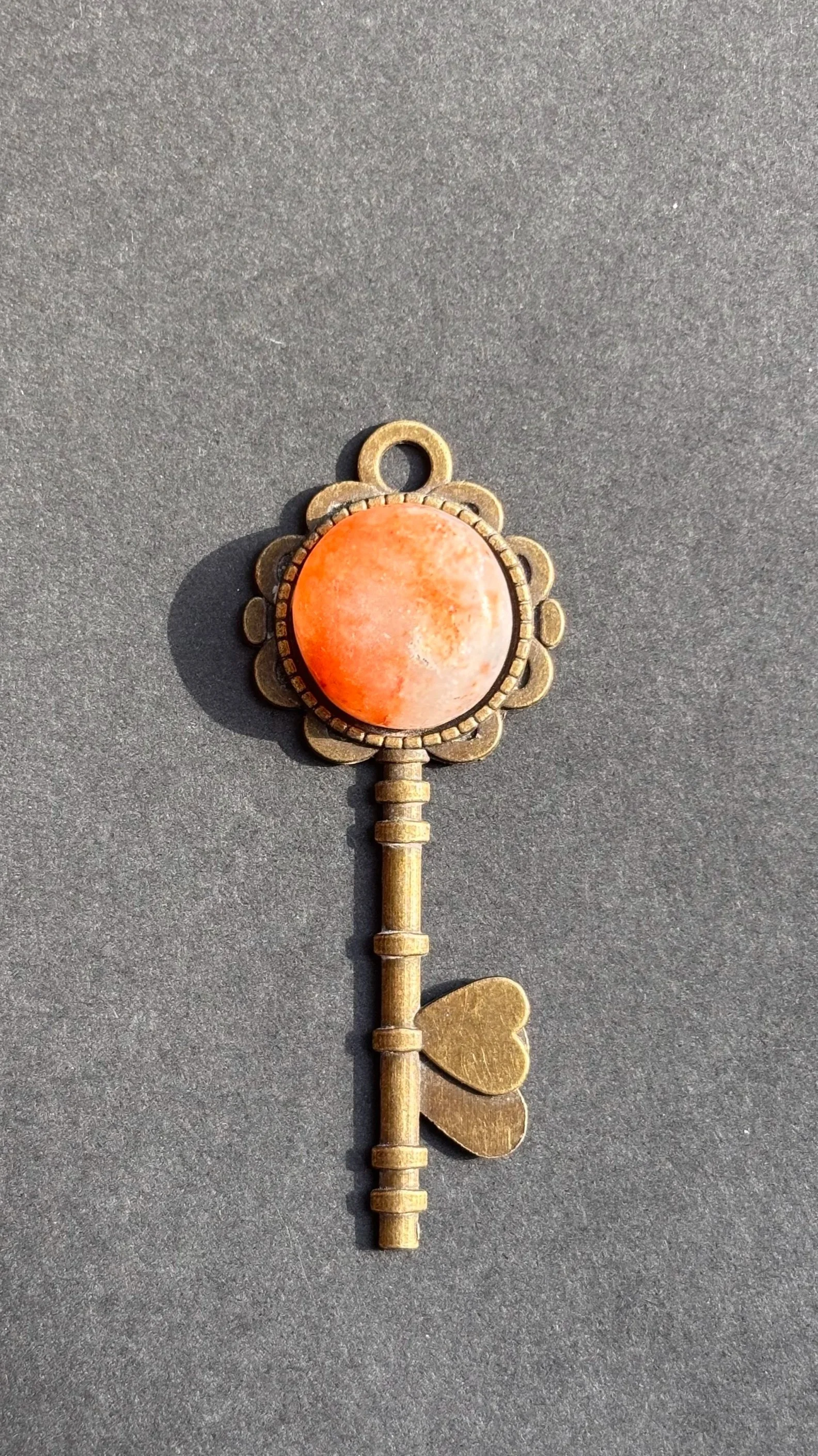 Enchanting Orange Stone Bronze Key Pendant Necklace