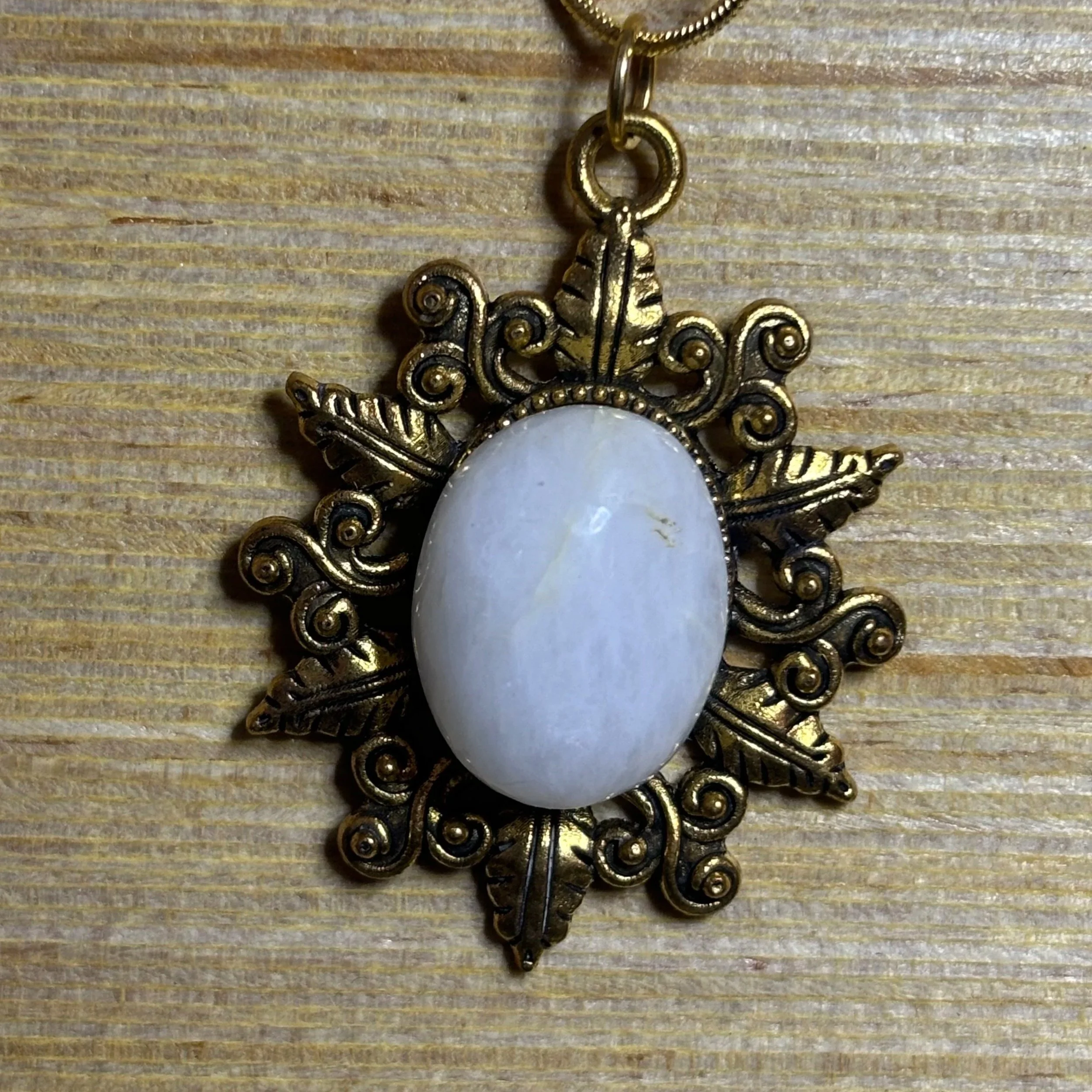 Gold Floral Pirate Pendant with Quartz