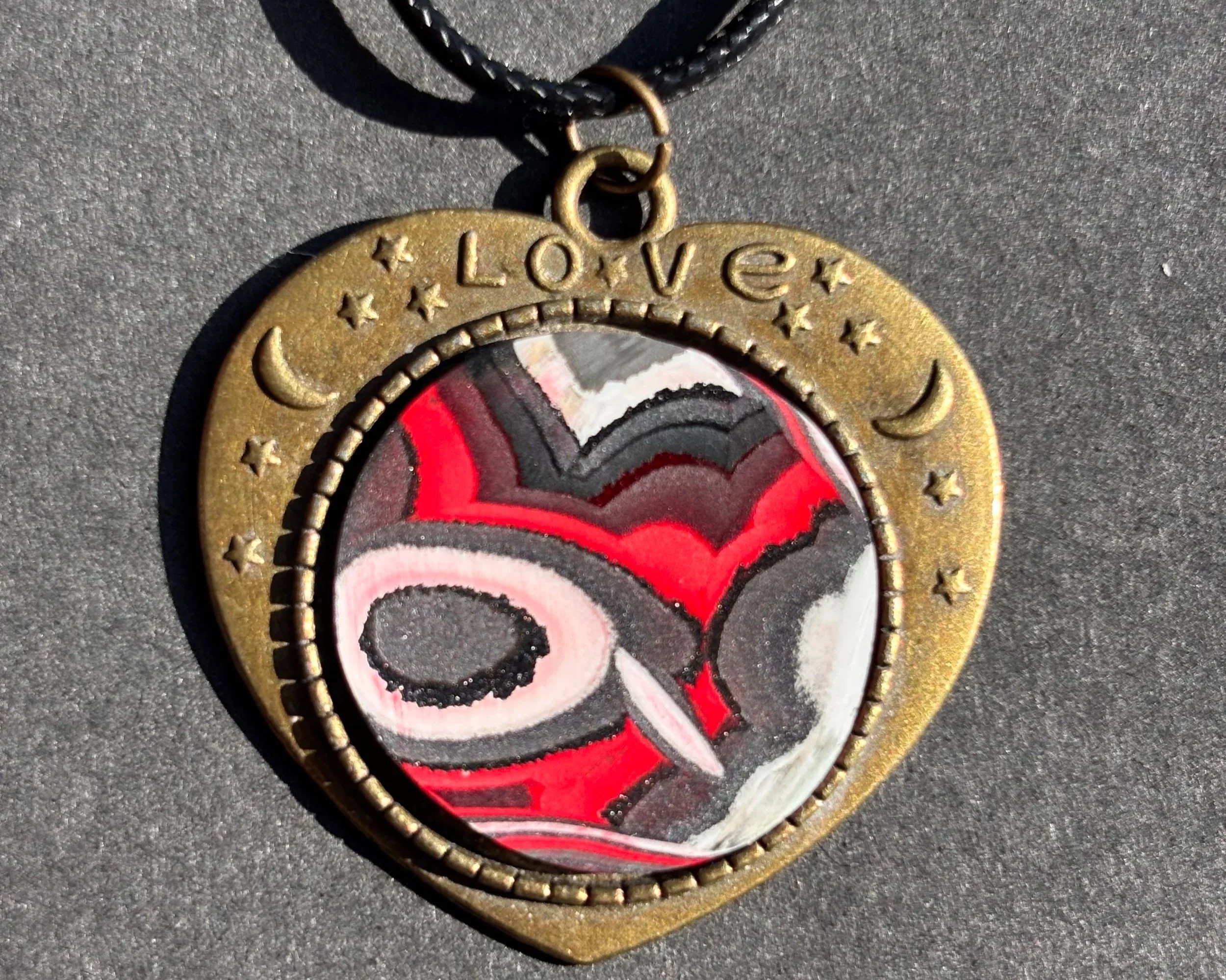 Bronze Heart Artistry Pendant with Black Cord