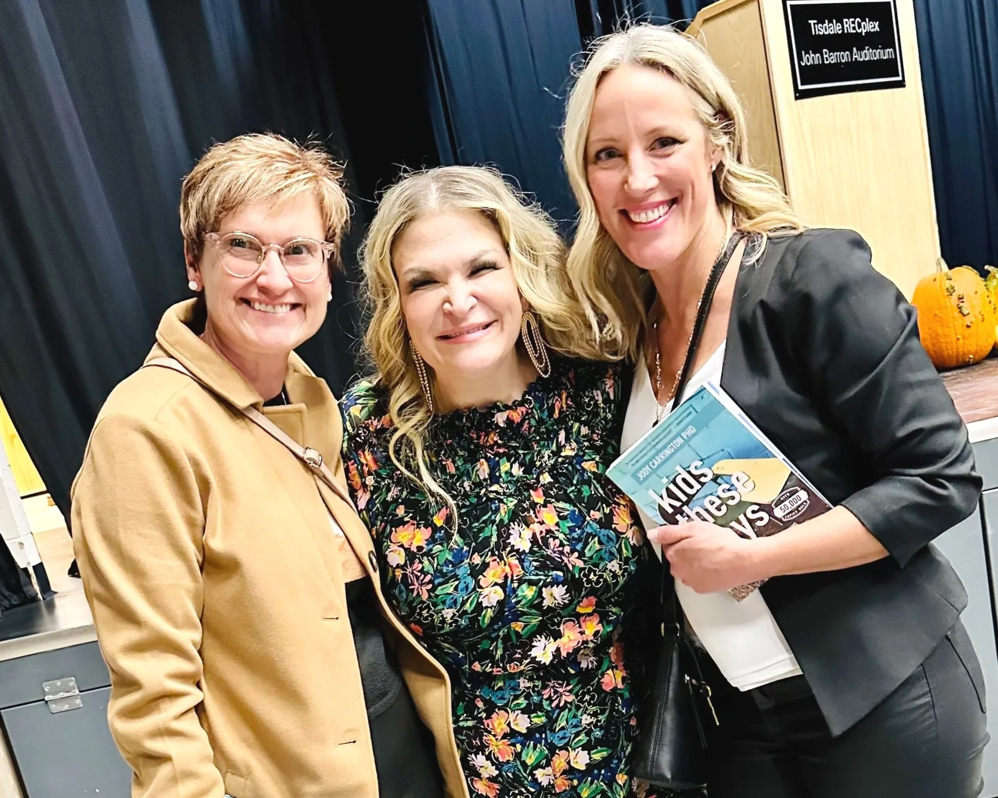 This lady delivers wisdom, wit and a fantastic evening of inspiration! Do not hesitate to attend a Dr. Jodi Carrington (middle) event!