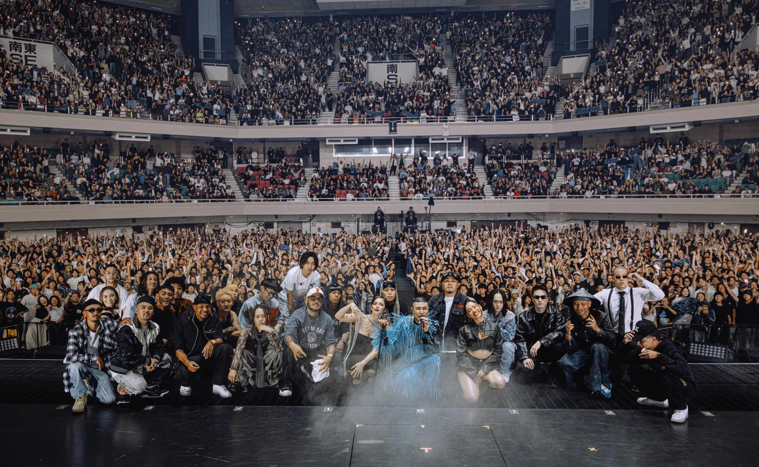 Large crowd at Budokan Arena in Japan for rapper OZworld's show at which Emi was a guest performer