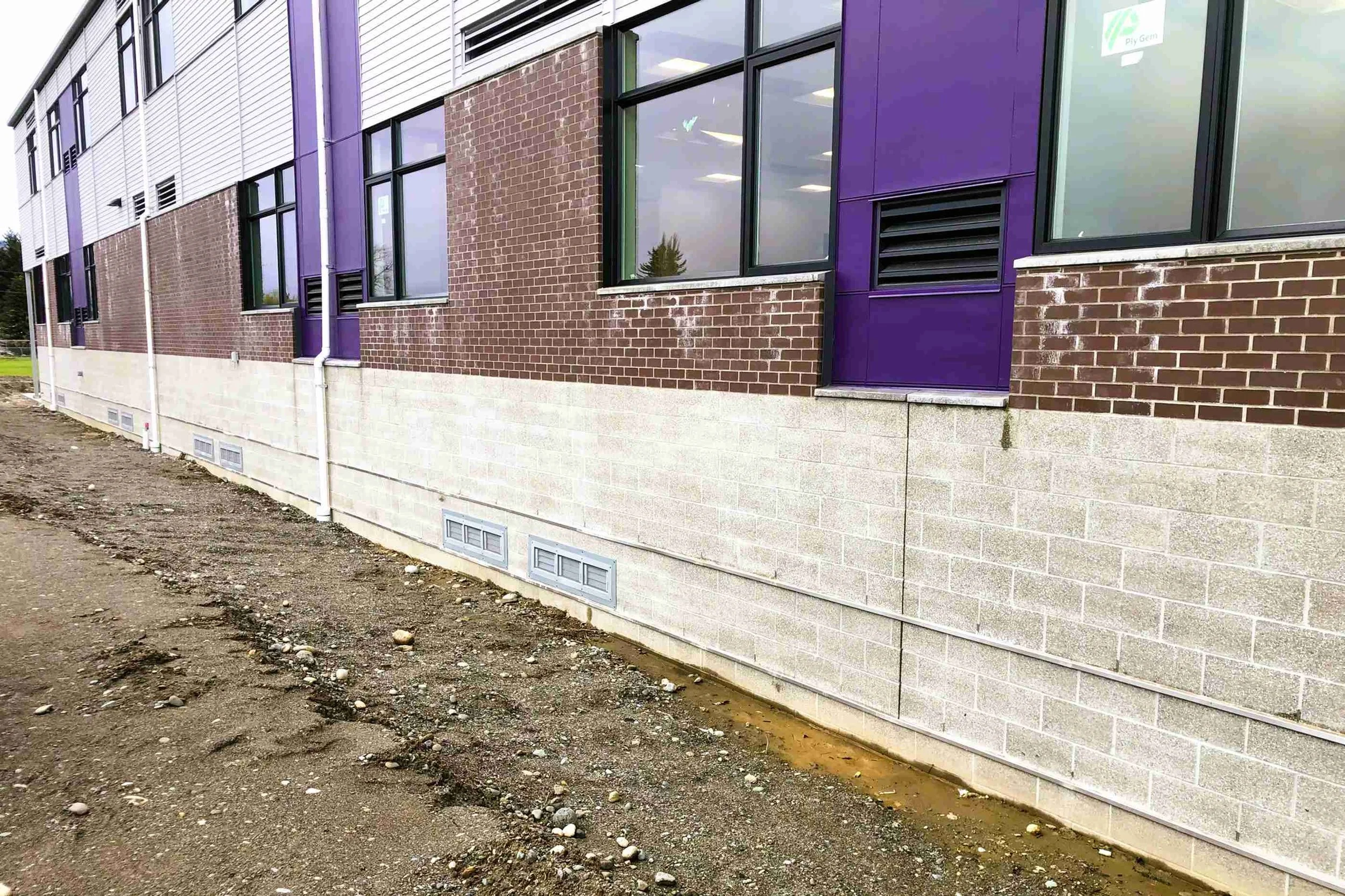 Educational campus building with code-compliant flood protection systems to support long-term institutional resilience