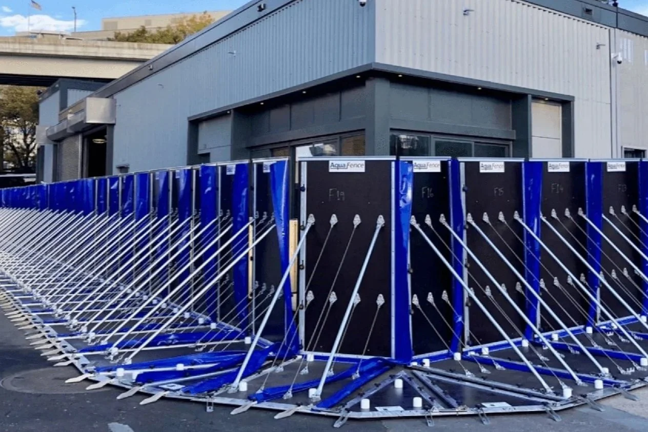Freestanding modular flood barrier system installed for site-scale and perimeter flood mitigation.