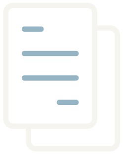 Stack of papers or documents with lines of text.