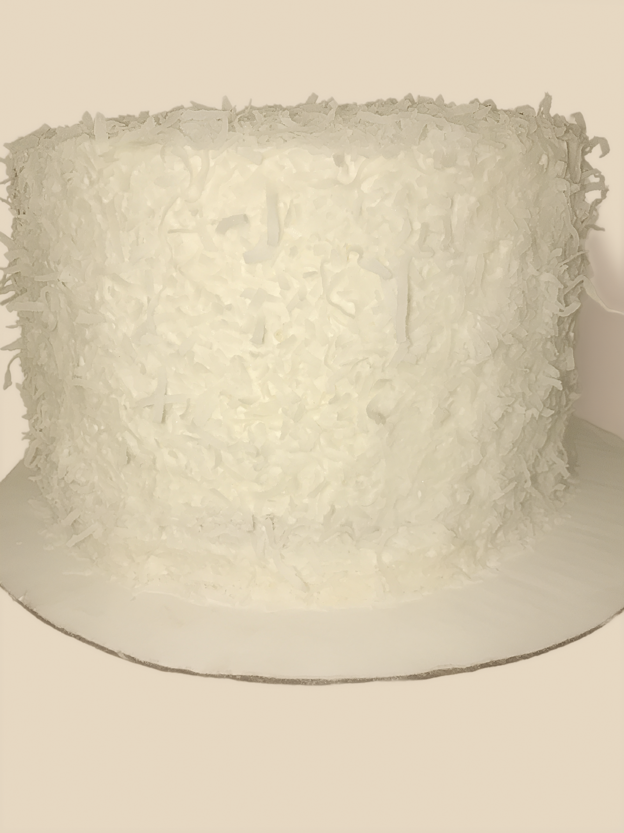 Vanilla coconut cake filled with German coconut and pecans. 
