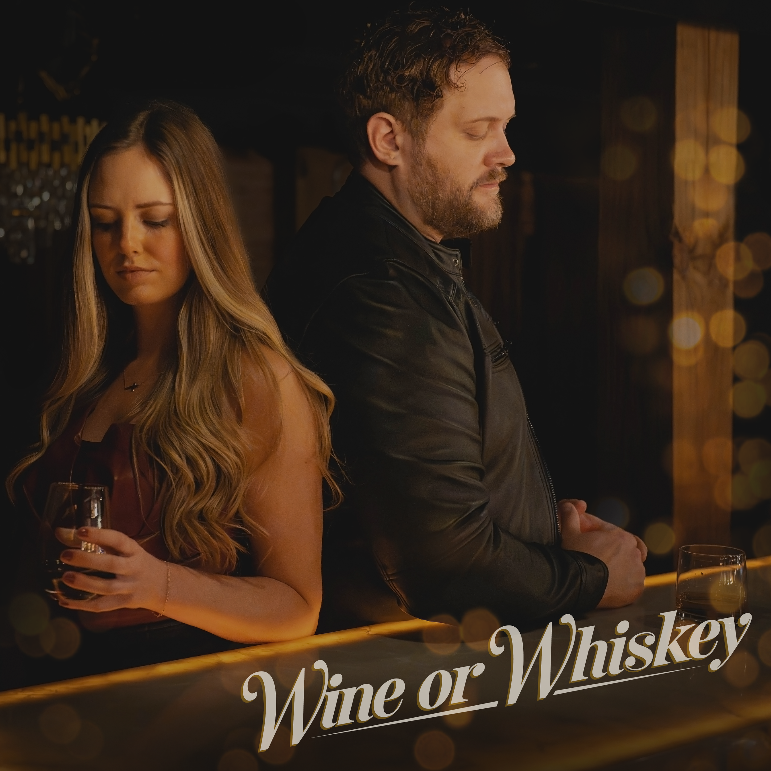 A man and woman standing with their backs to each other at a bar, with drinks in front of them, in a dimly lit setting, with the text "Wine or Whiskey" at the bottom.