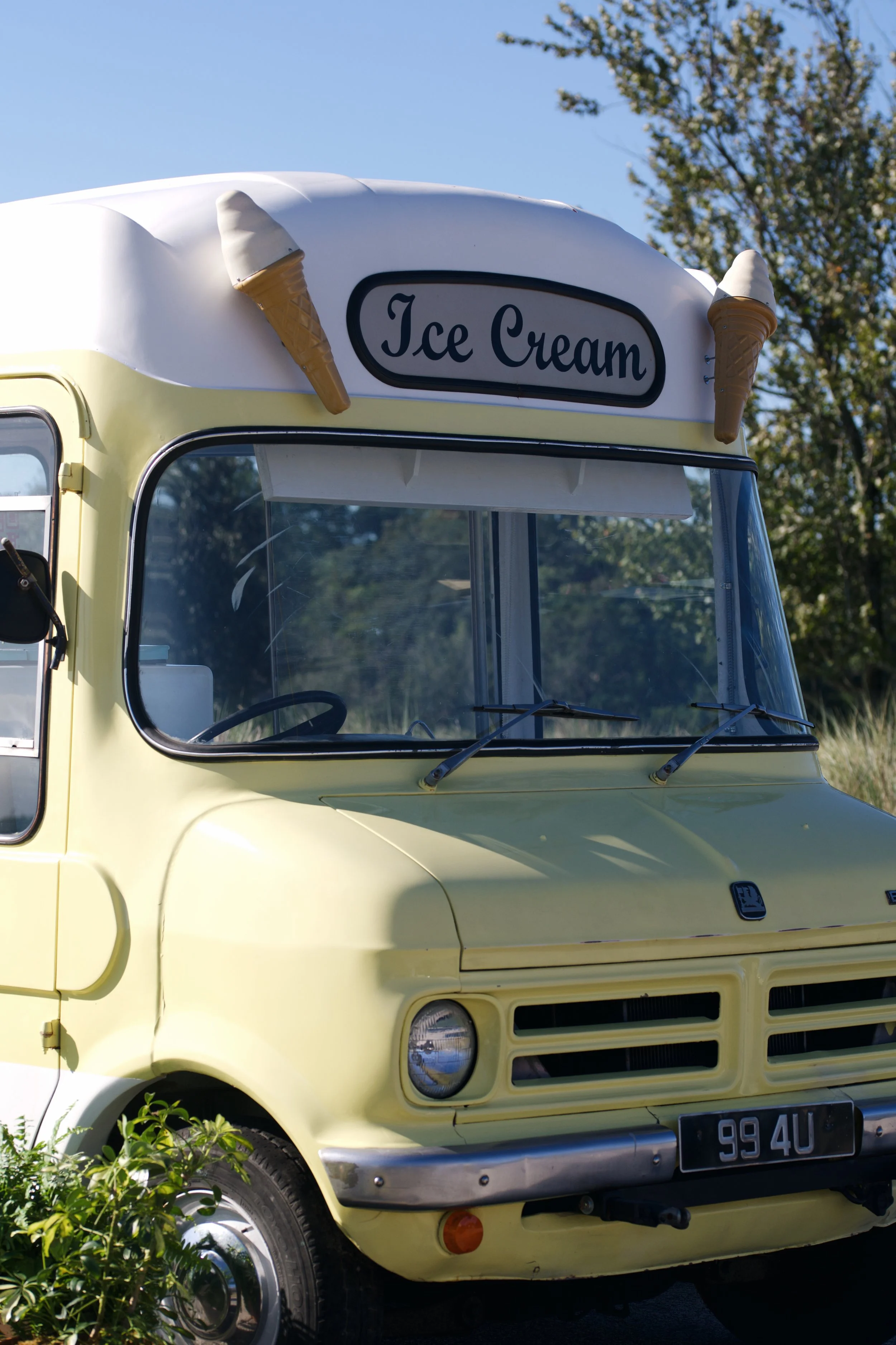Close up of the front of a 1971 Bedford Ice Cream Van - That's Amore Ice Cream Caters soft serve ice cream to Charleston South Carolina weddings and events.