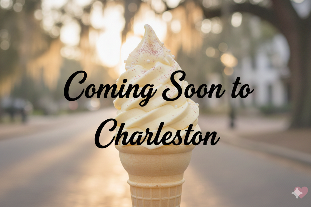 Premium-soft-serve-sugar-cone-coming-soon-to-Charleston-SC-weddings.  An ice cream cone with white soft serve ice cream and pink sprinkles, with a blurred street background and text overlay saying 'Coming Soon to Charleston'.