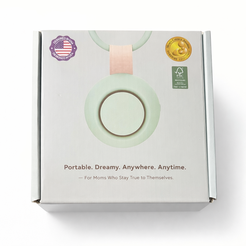 Packaging box with text, a circular design, and various logos including American-made and eco-friendly symbols, for a product aimed at moms.