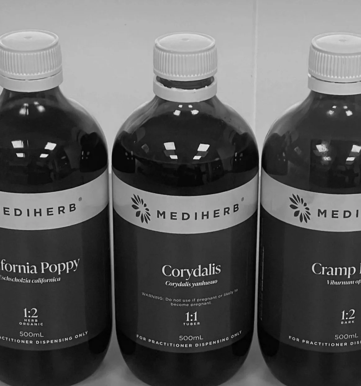 Three bottles of herbal tincture labeled Mediherb, containing California Poppy, Corydalis, and Cramp Bark, each 500ml, for practitioner dispensing only.