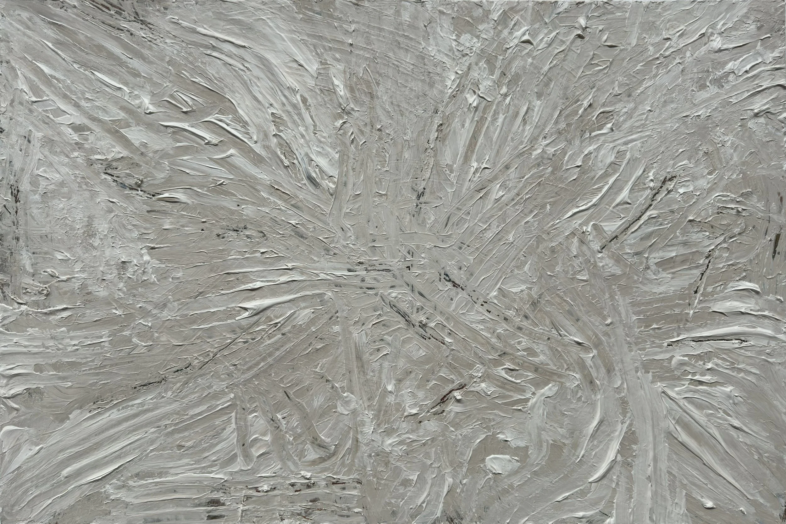 White and beige paint piled on top of and clawed away from a panel