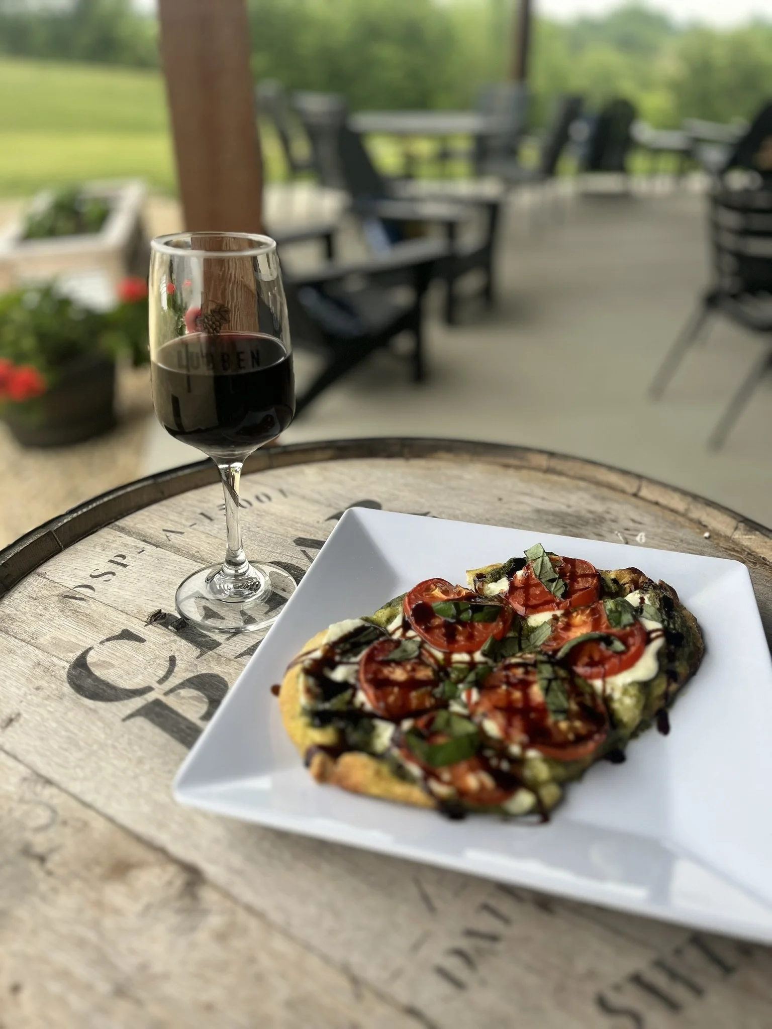 Flatbread with wine on barrel.JPEG