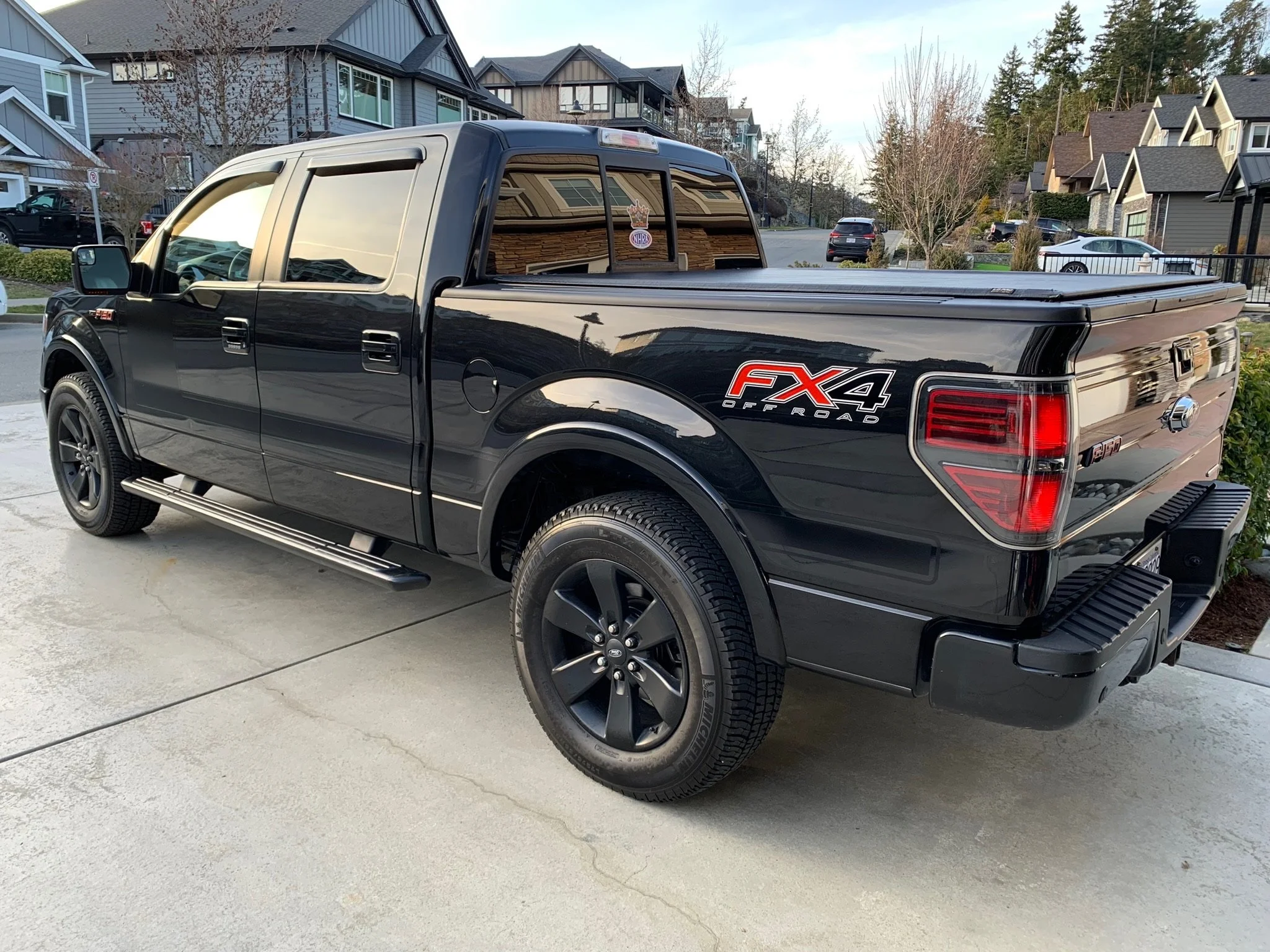Black pick up truck, freshly detailed.