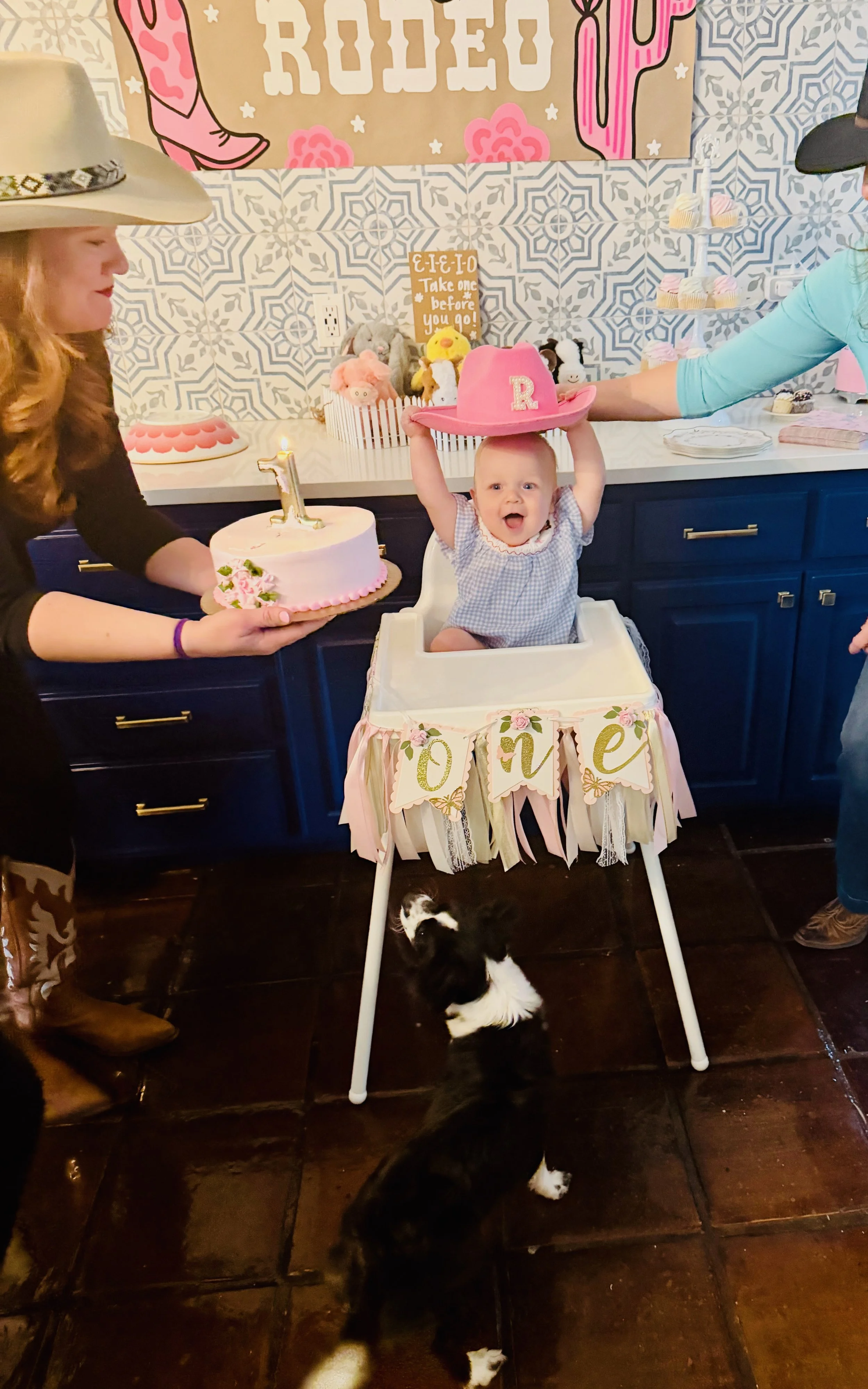 first birthday cake and cowboy hat