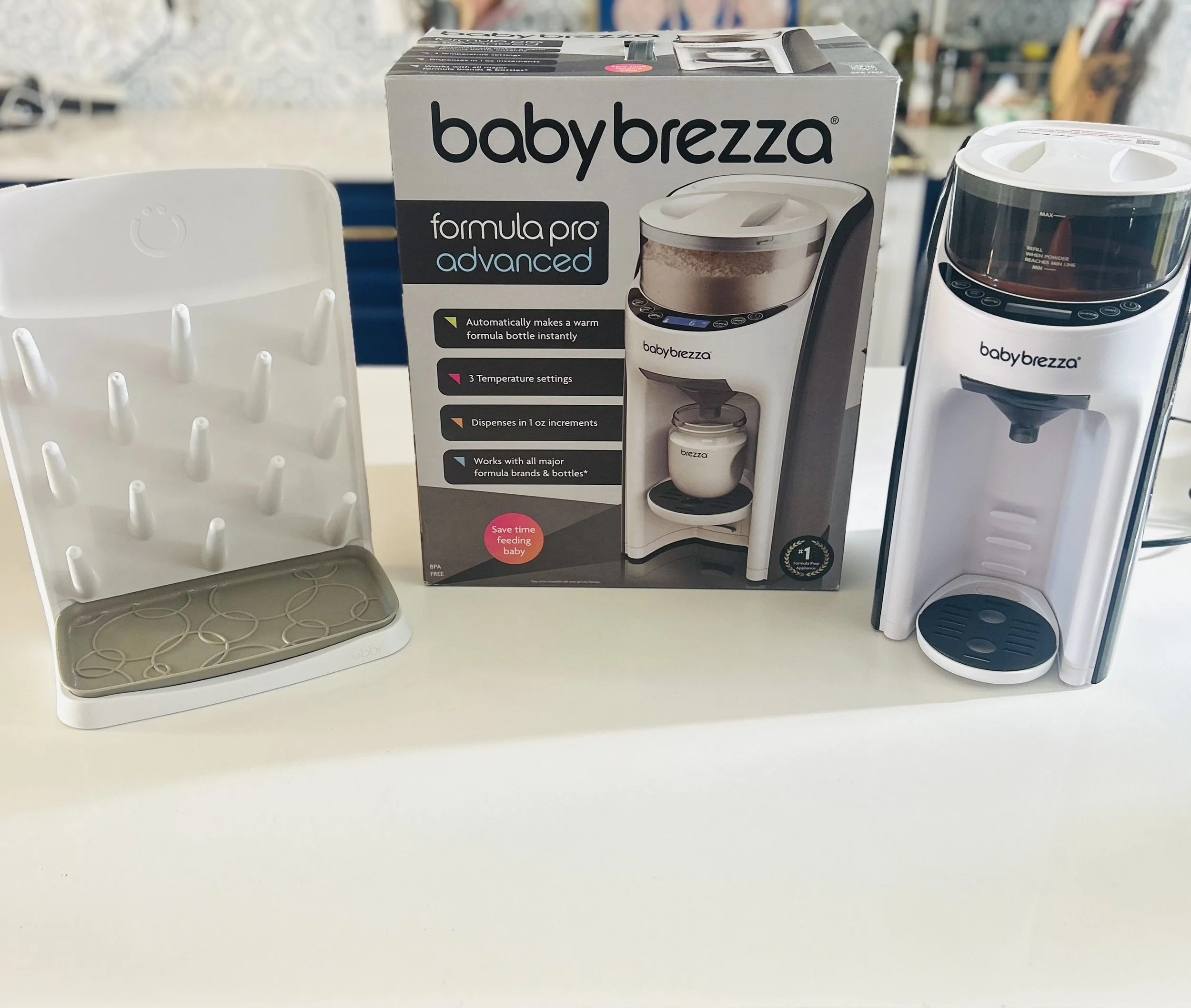 Baby Brezza Formula Advanced Pro paired with the mother of all drying racks—Ubbi Verticial Drying Rack