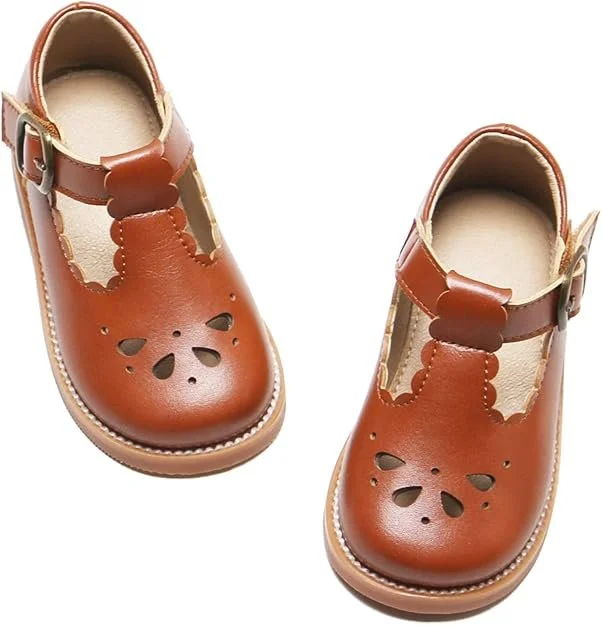 Brown Felix and Flora Mary Jane shoes for toddlers with a tee strap buckle and petal cut outs.