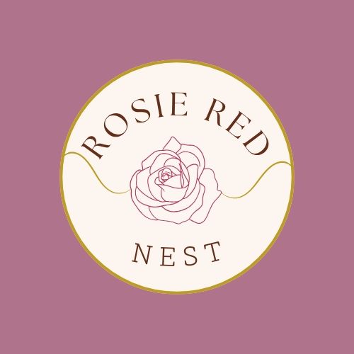 Logo for Rosie Reed Nest featuring a pink rose and the business name in elegant brown text on a white circular background with a dusty rose border.