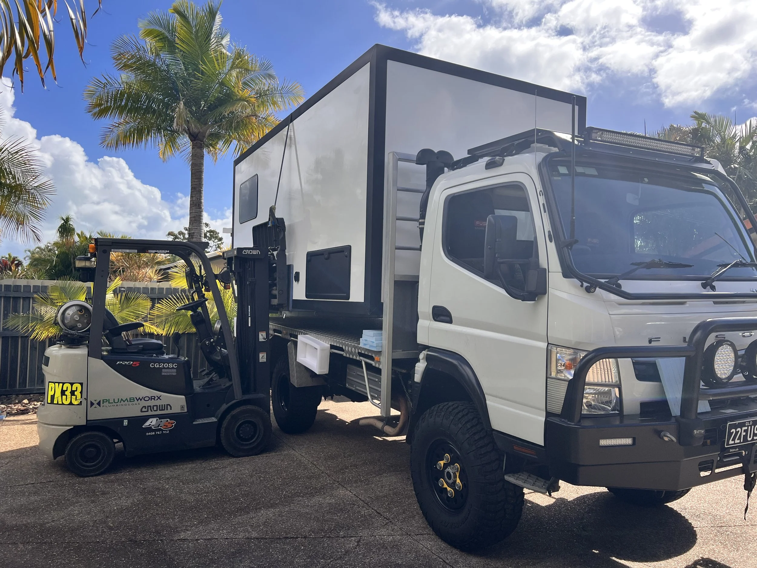 Habitation box being installed to Fuso Truck