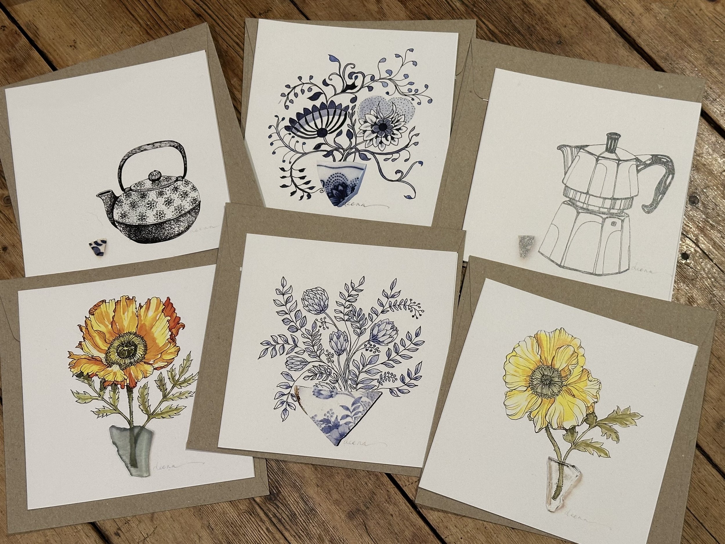 pack of six cards spread to show included images
