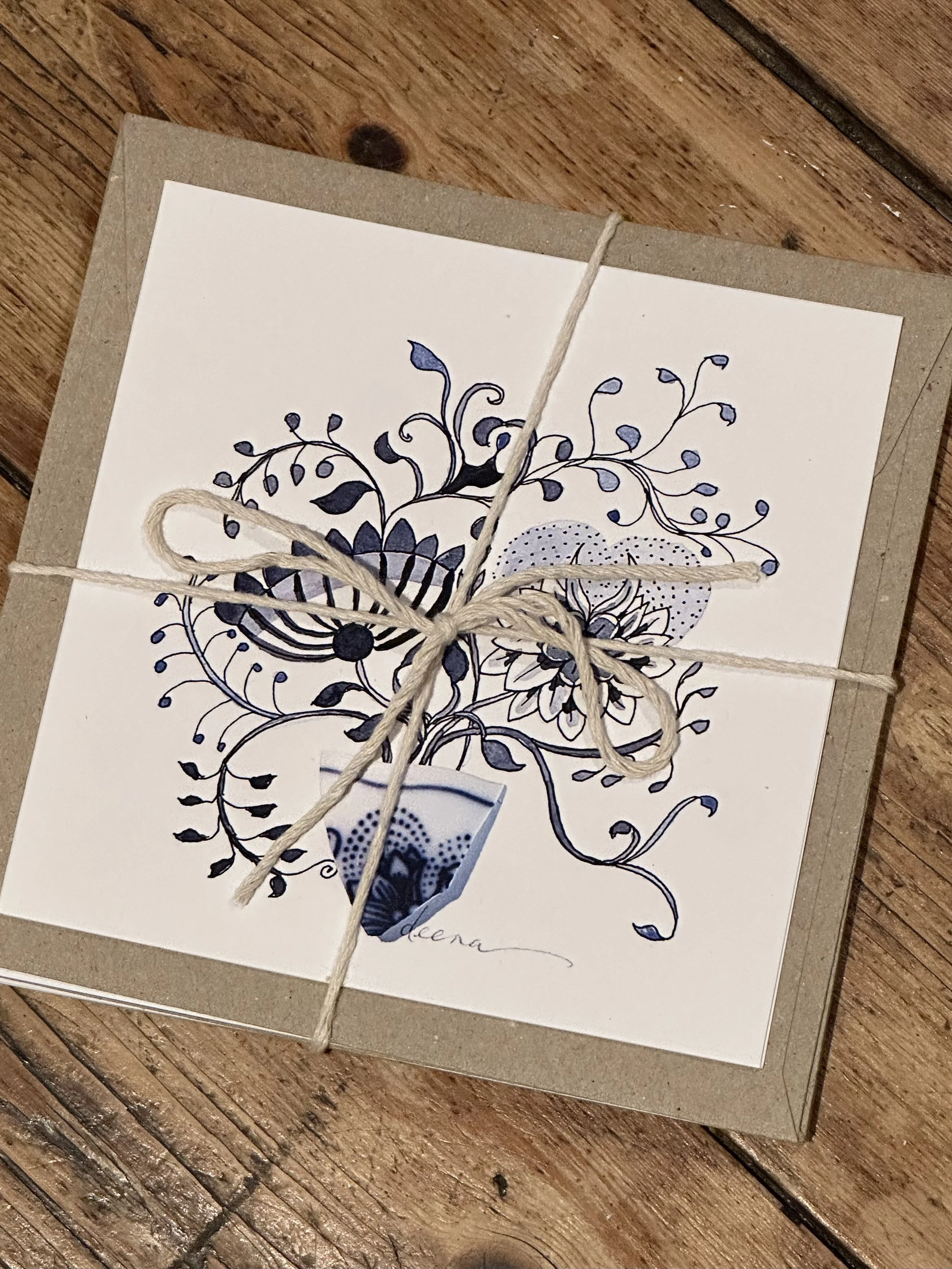 Pack of six gift cards with envelopes tied with string