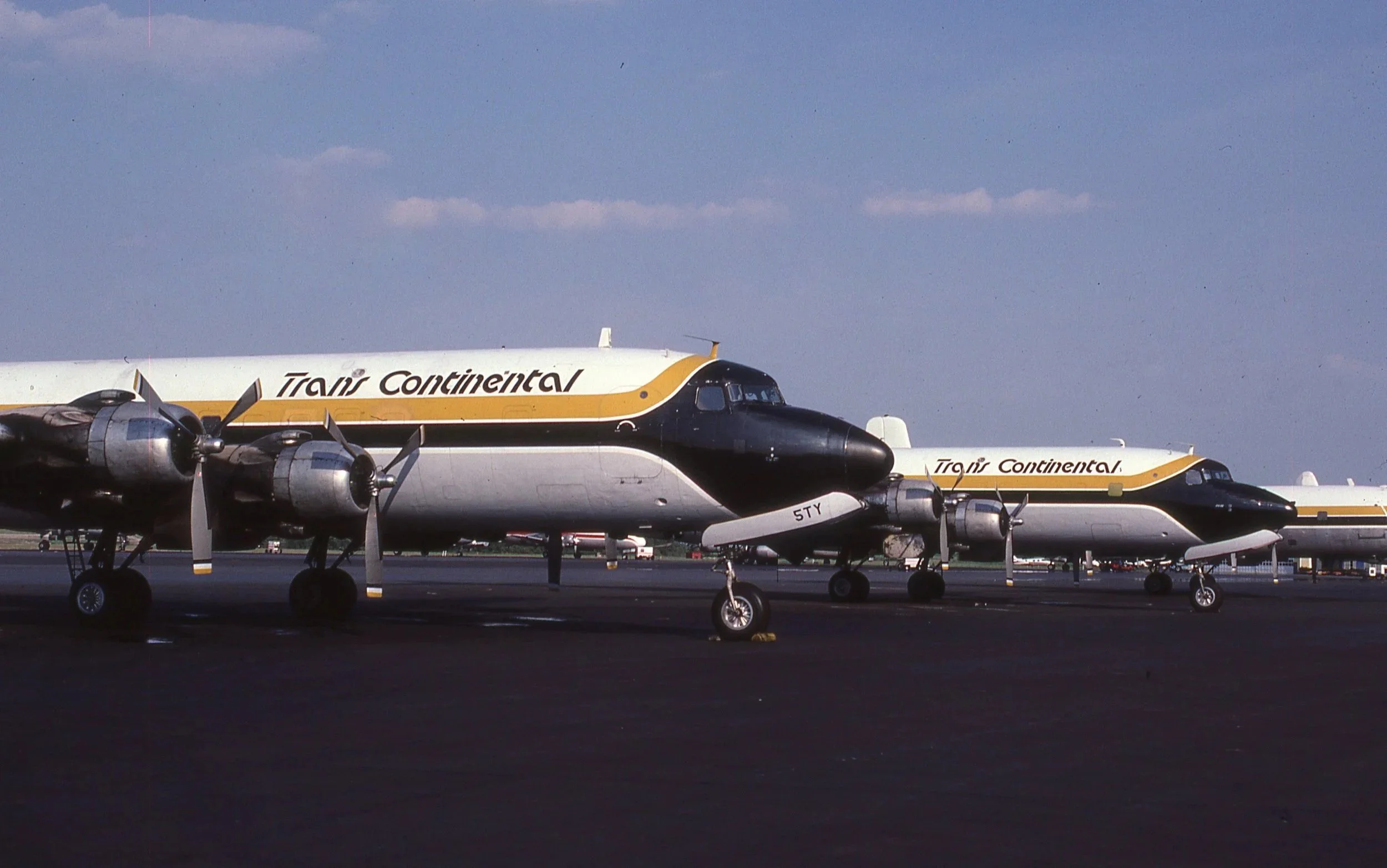 TRANS CONTINENTAL DC-6 LINE UP AT YIP