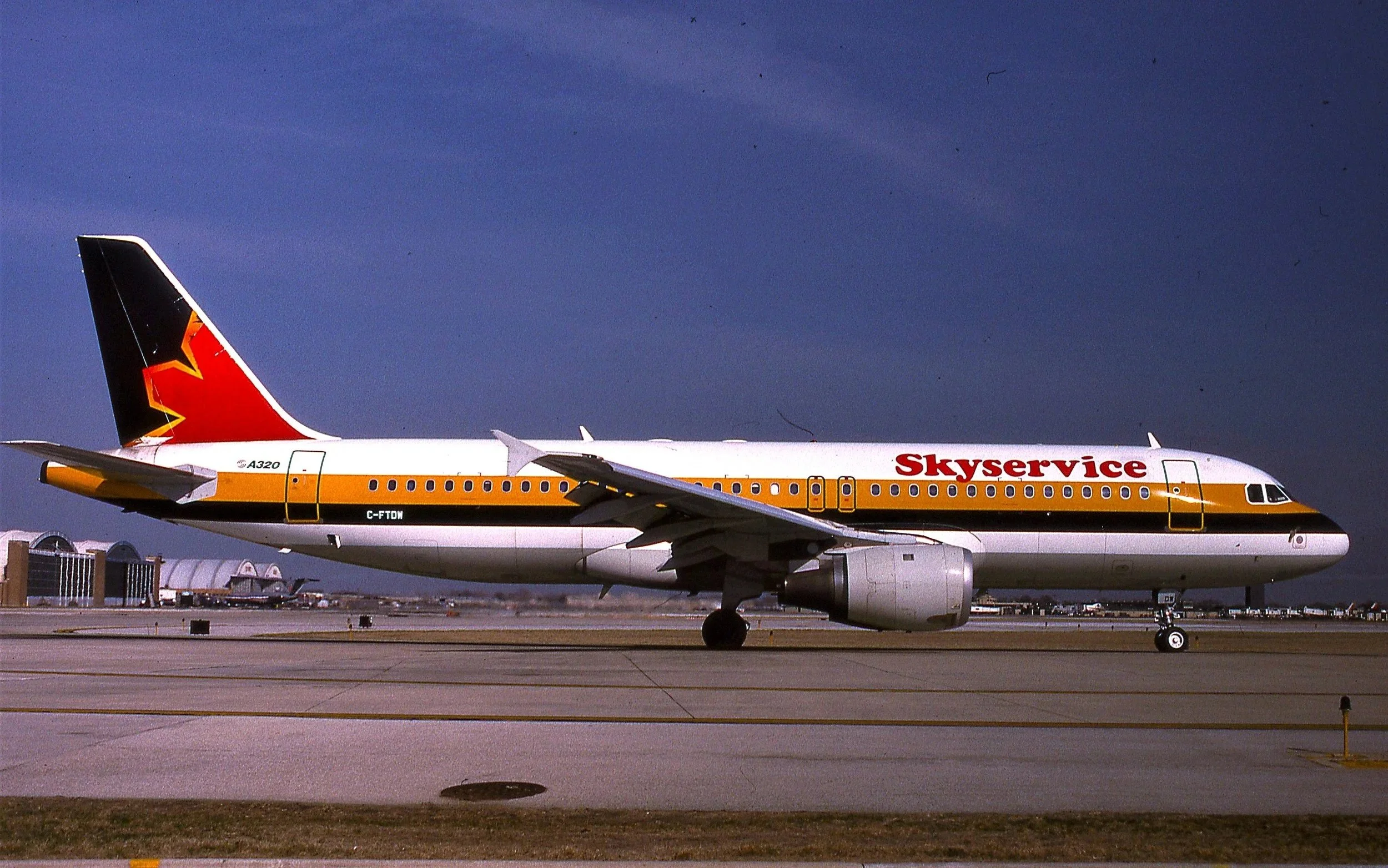 C-FIDN A320 SKYSERVICE/MONARCH COLORS MDW 31C