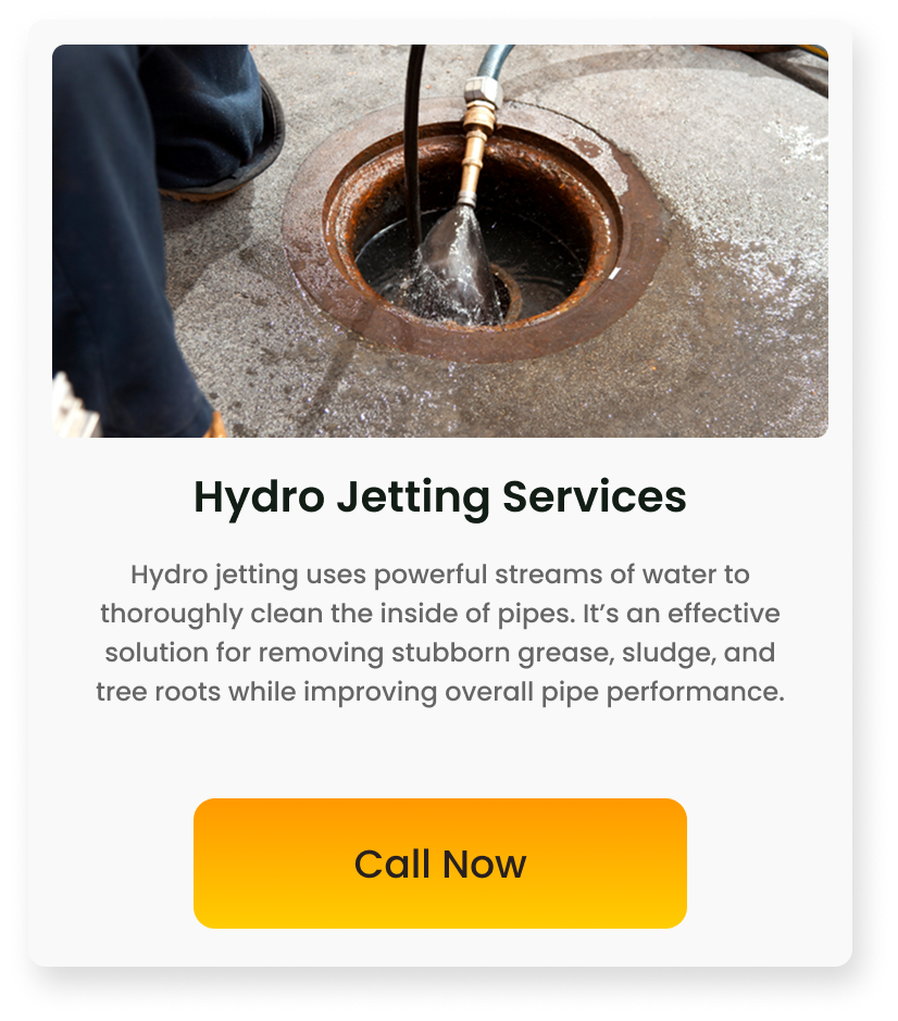Close-up of a pipe opening on concrete with water jetting into it, part of a hydro jetting service advertisement.