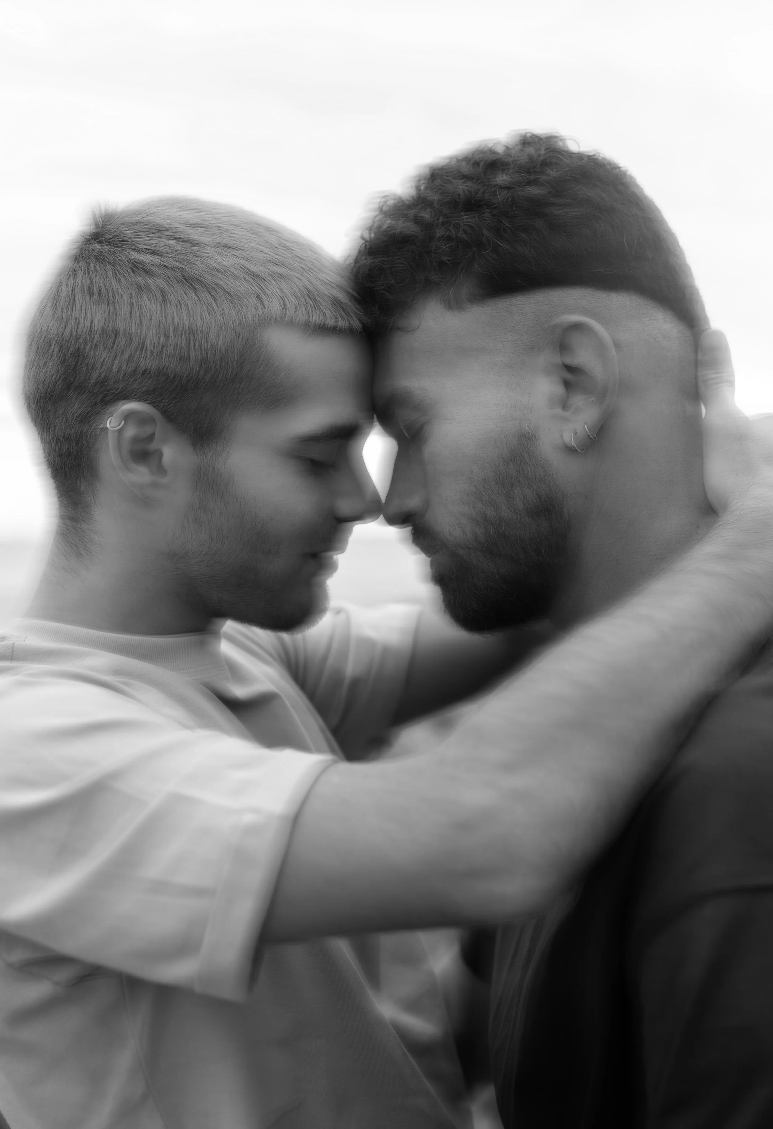 Queer couple embracing, brand photography for Rachael Benjamin Therapy.
