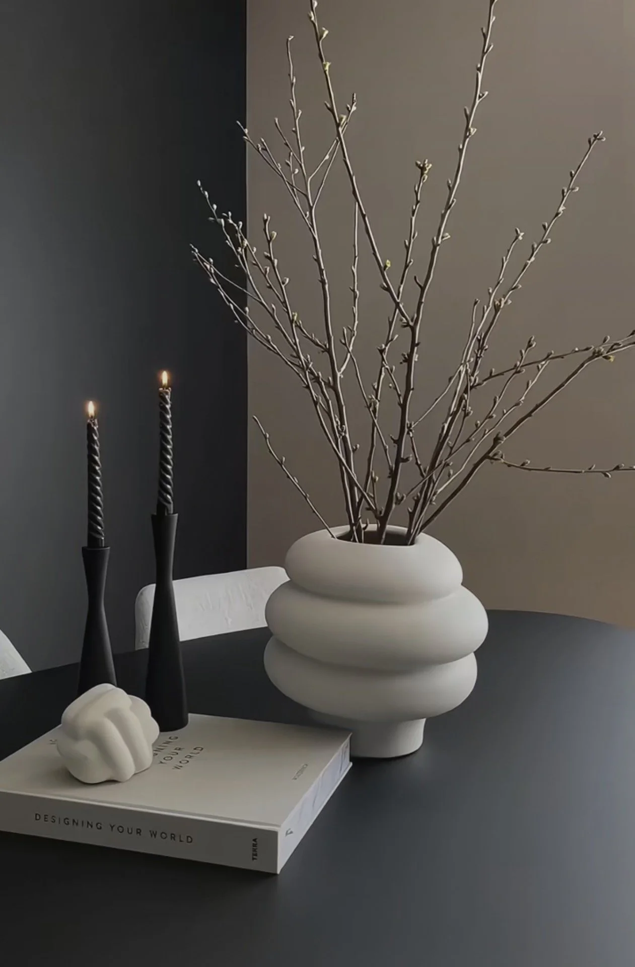 Stylish, curated tabletop arrangement with elegant accents, reflecting Maisonvale Escapes’ boutique and design-led interior style.