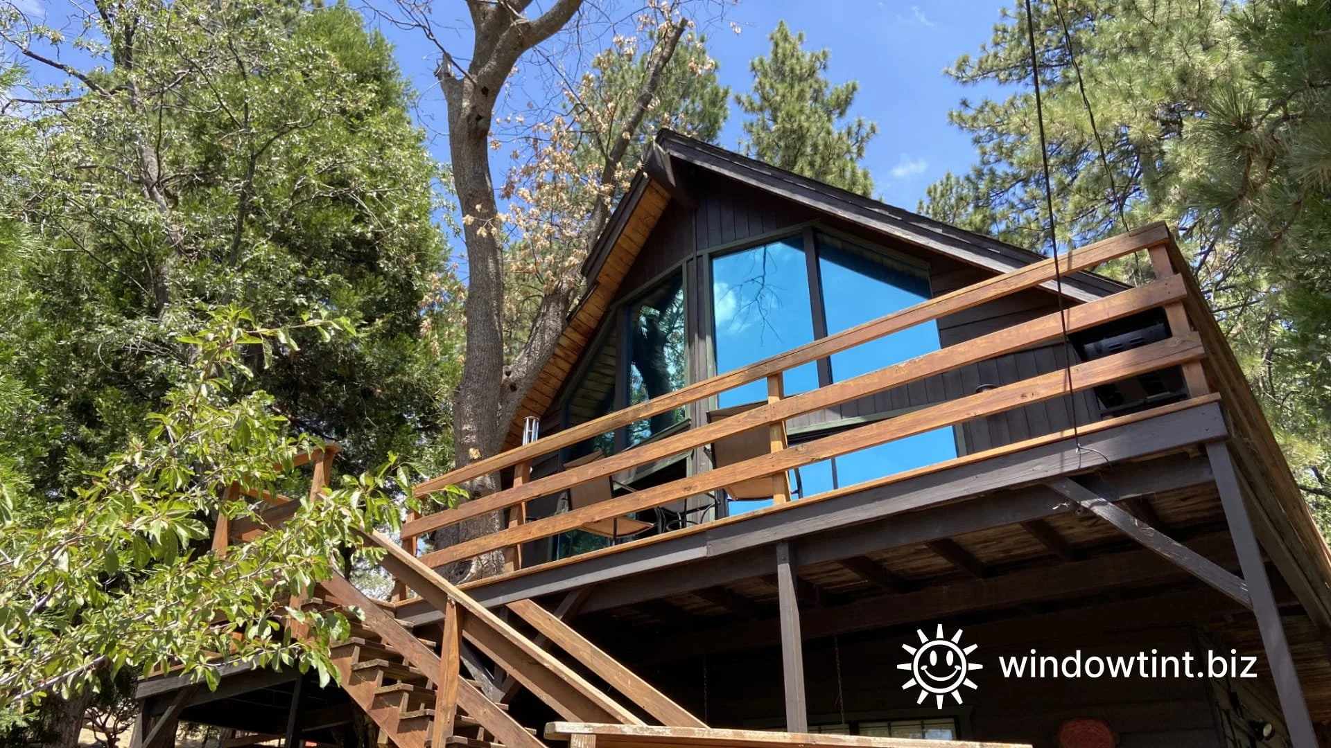 Large cabin windows with clear window film in Running Springs CA designed to reduce sun glare and heat without changing the appearance of the glass